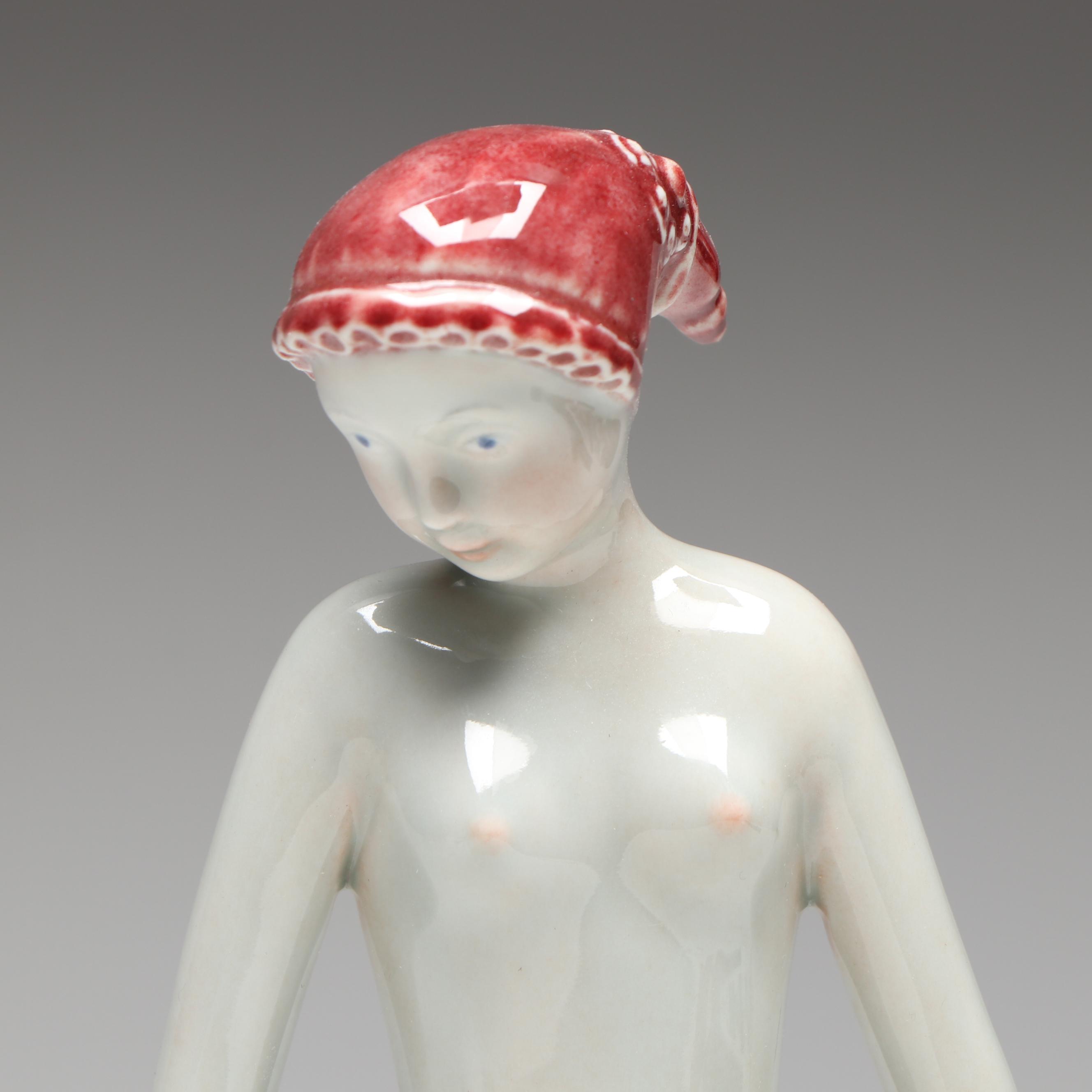 Georg Thylstrup for Royal Copenhagen Porcelain Woman and Dog Figurine