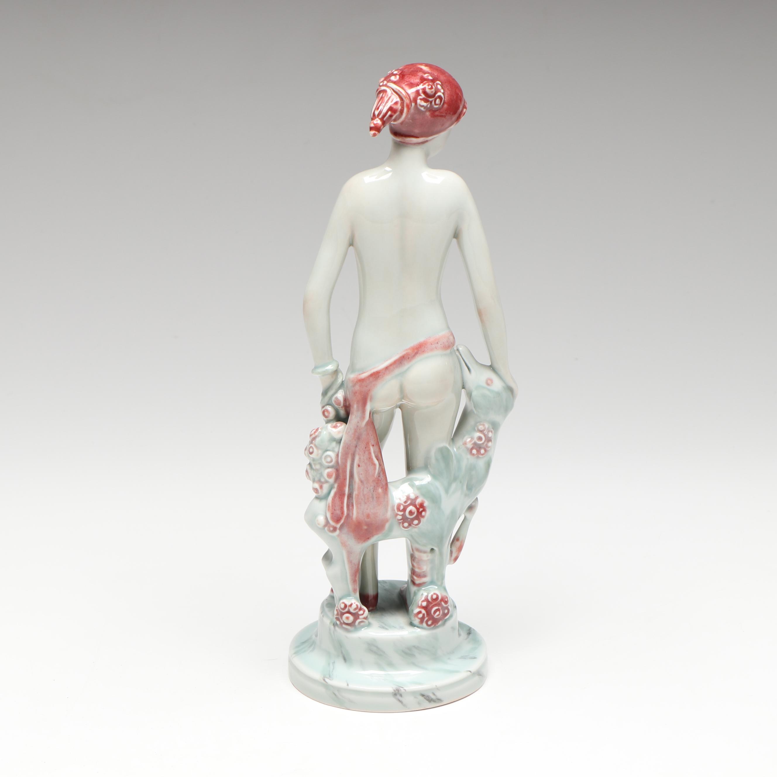 Georg Thylstrup for Royal Copenhagen Porcelain Woman and Dog Figurine