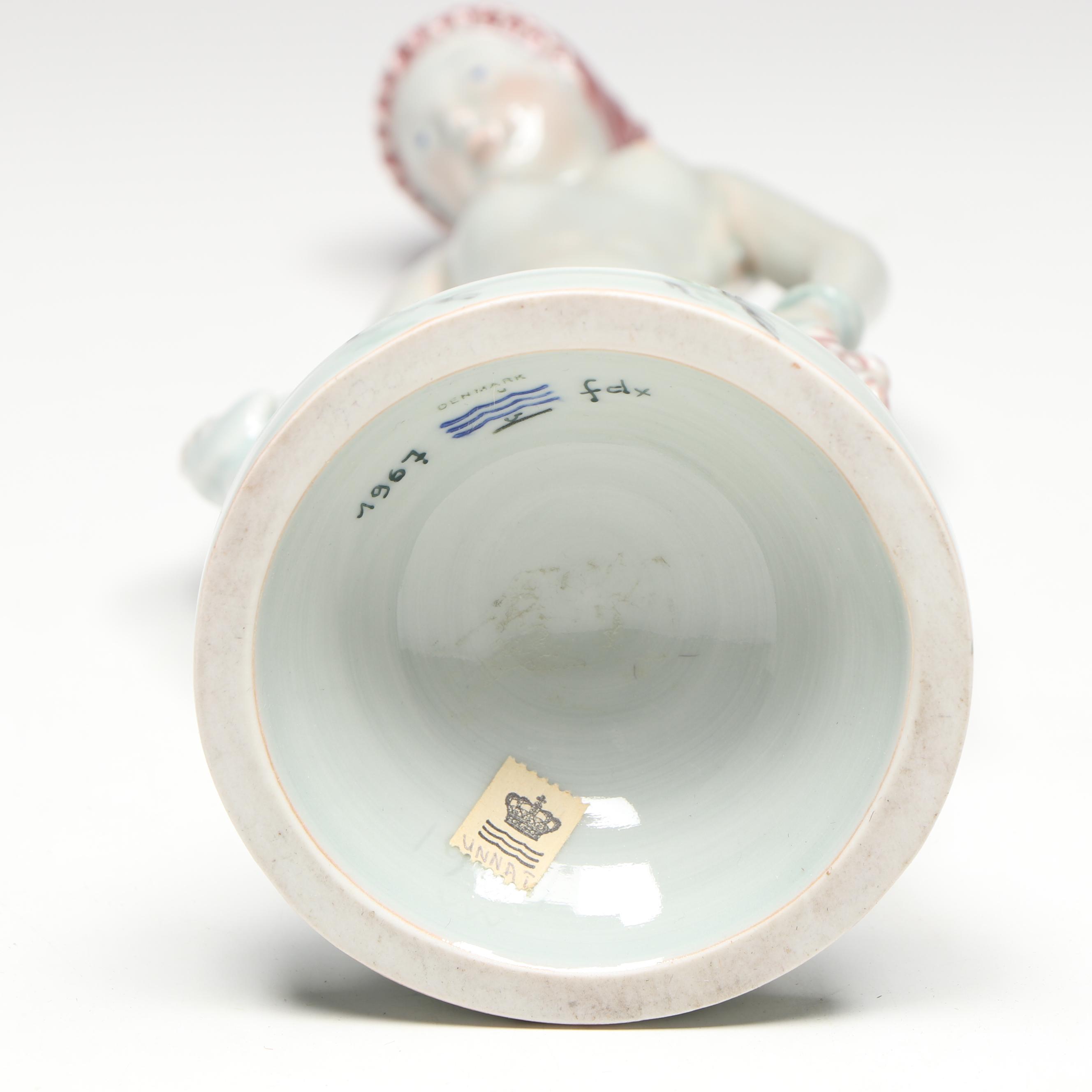 Georg Thylstrup for Royal Copenhagen Porcelain Woman and Dog Figurine