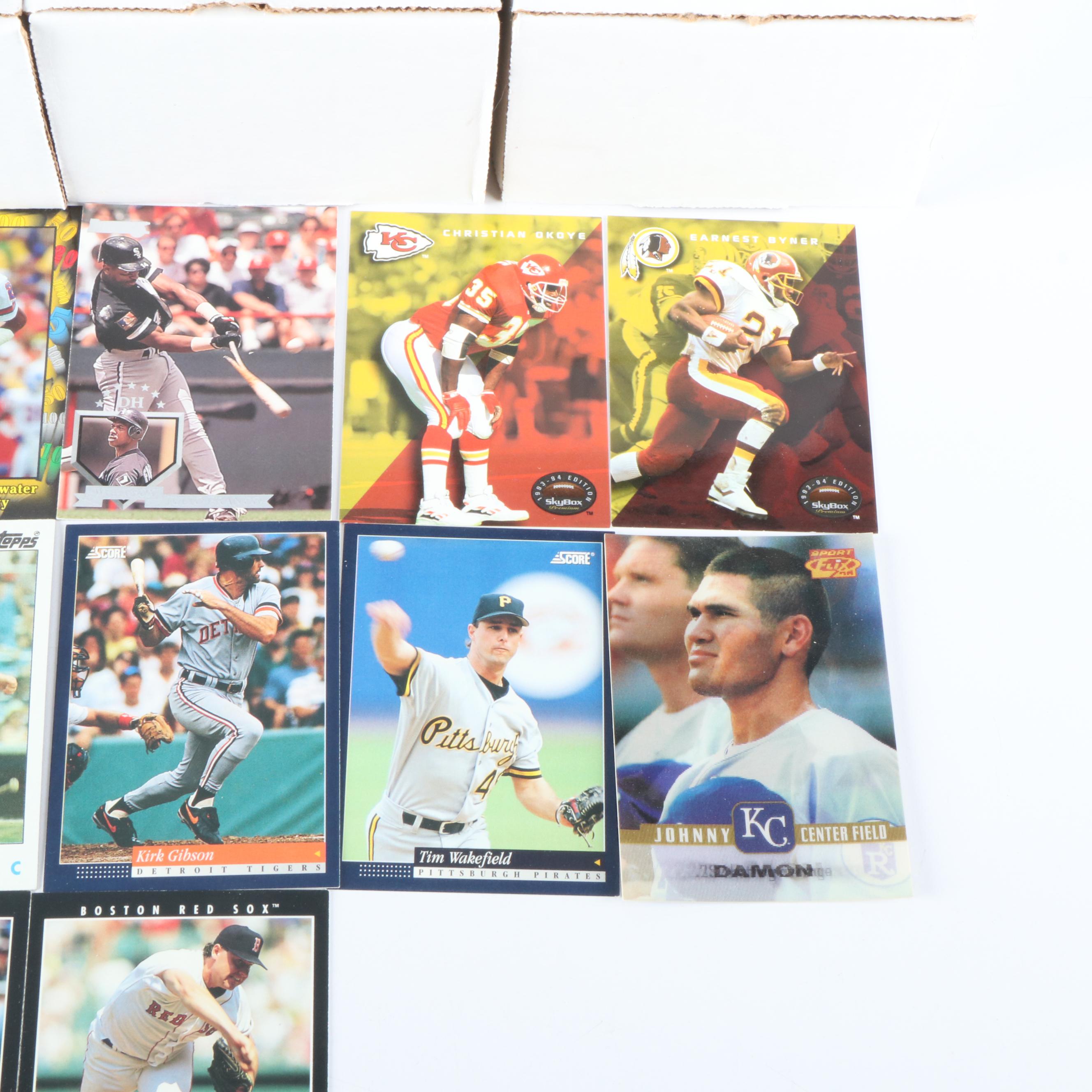 Sixteen Boxes of Baseball and Football Cards, 1980s to 1990s