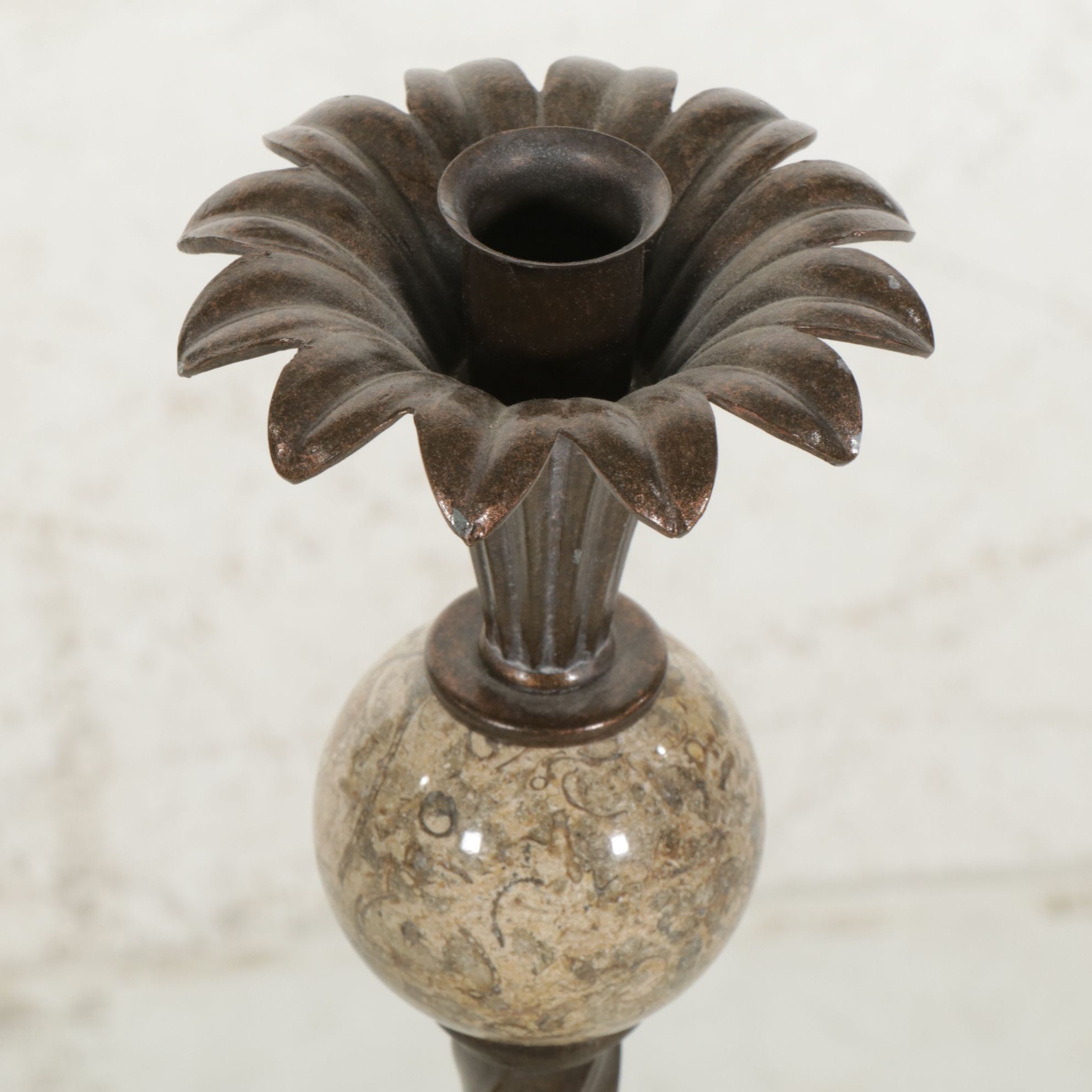 Bronzed Metal Spiral and Travertine Orb Candlesticks