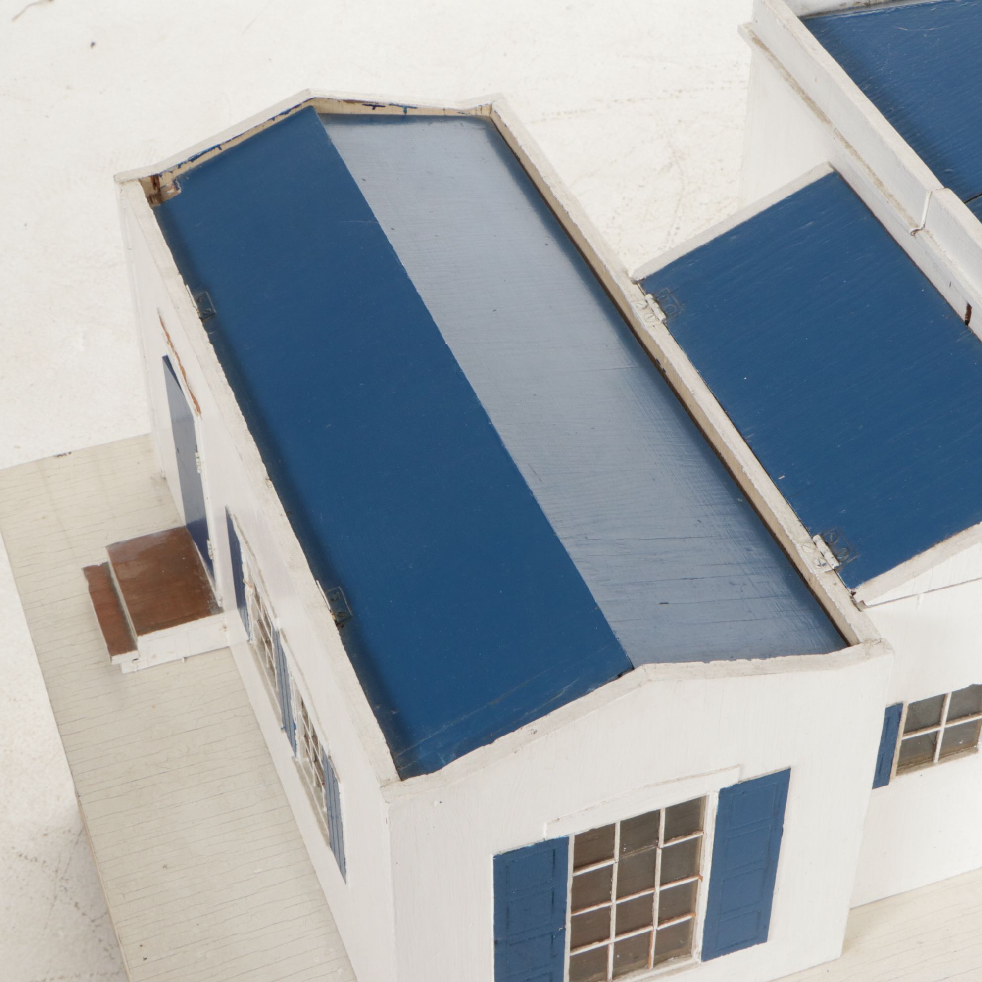 Furnished White and Cobalt Painted Wooden Dollhouse with Storage Cabinet Base