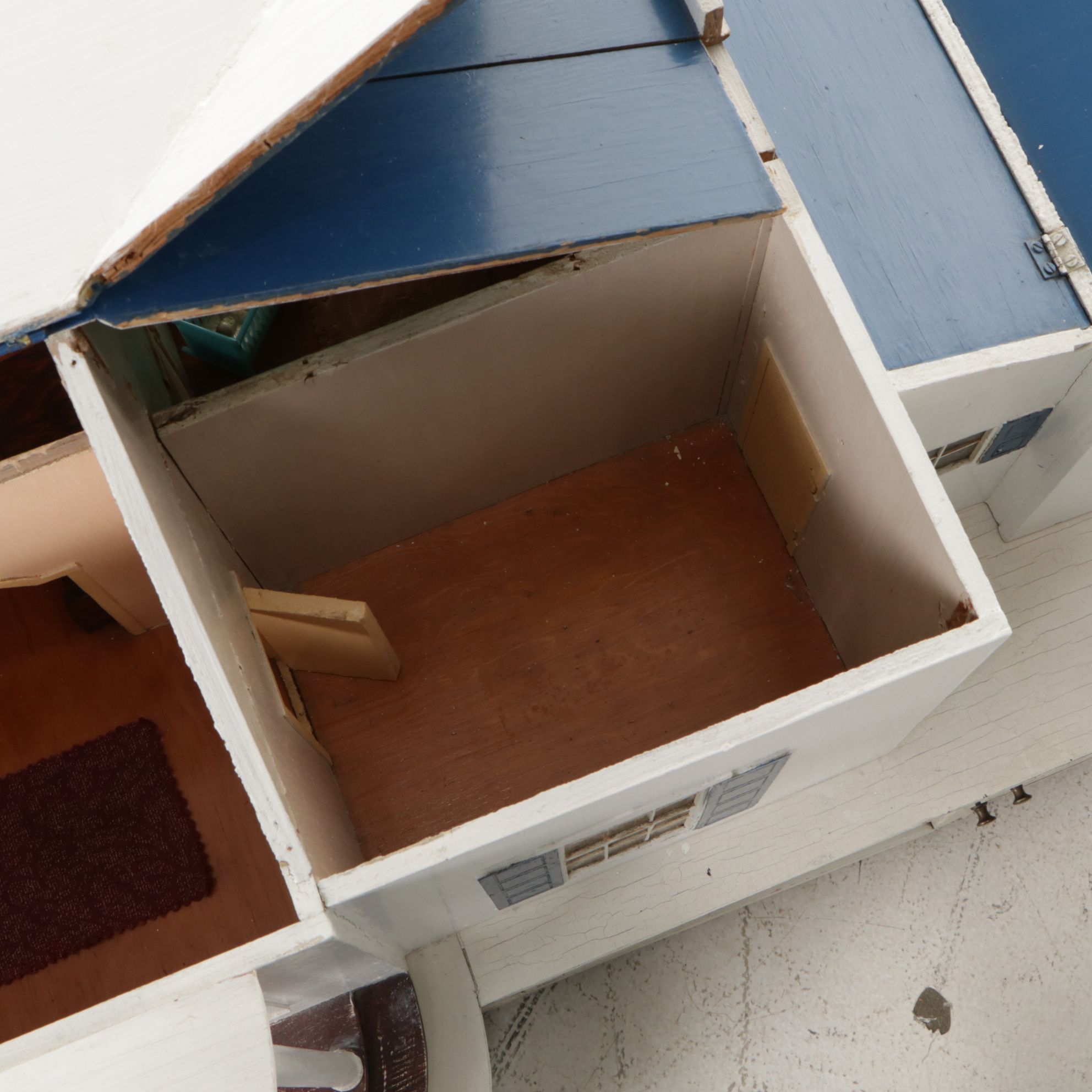 Furnished White and Cobalt Painted Wooden Dollhouse with Storage Cabinet Base