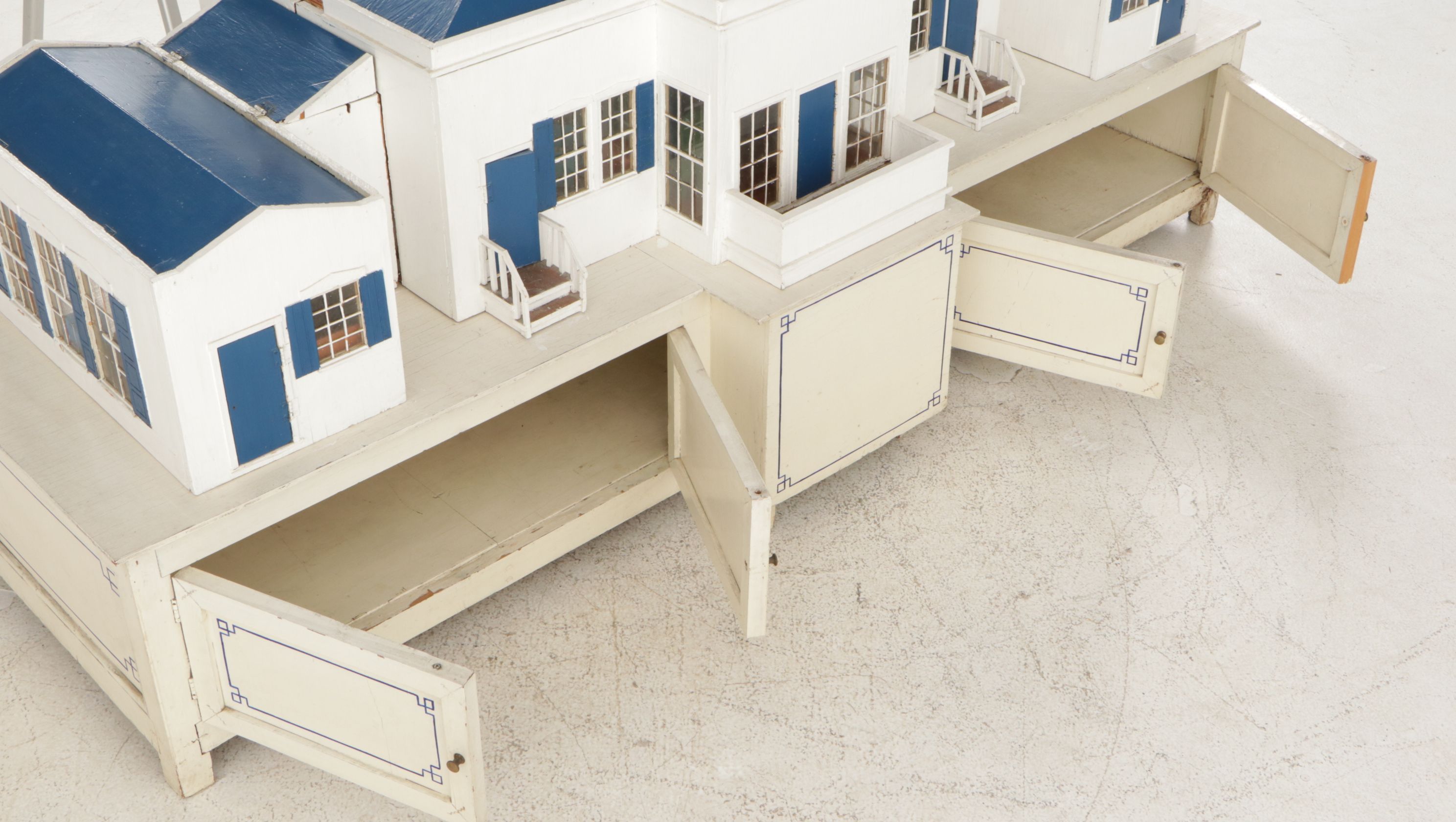 Furnished White and Cobalt Painted Wooden Dollhouse with Storage Cabinet Base