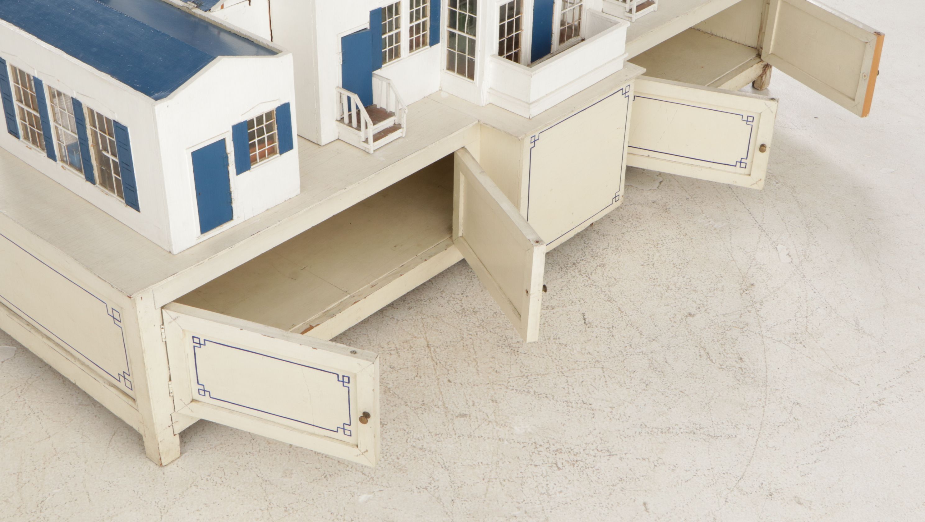 Furnished White and Cobalt Painted Wooden Dollhouse with Storage Cabinet Base
