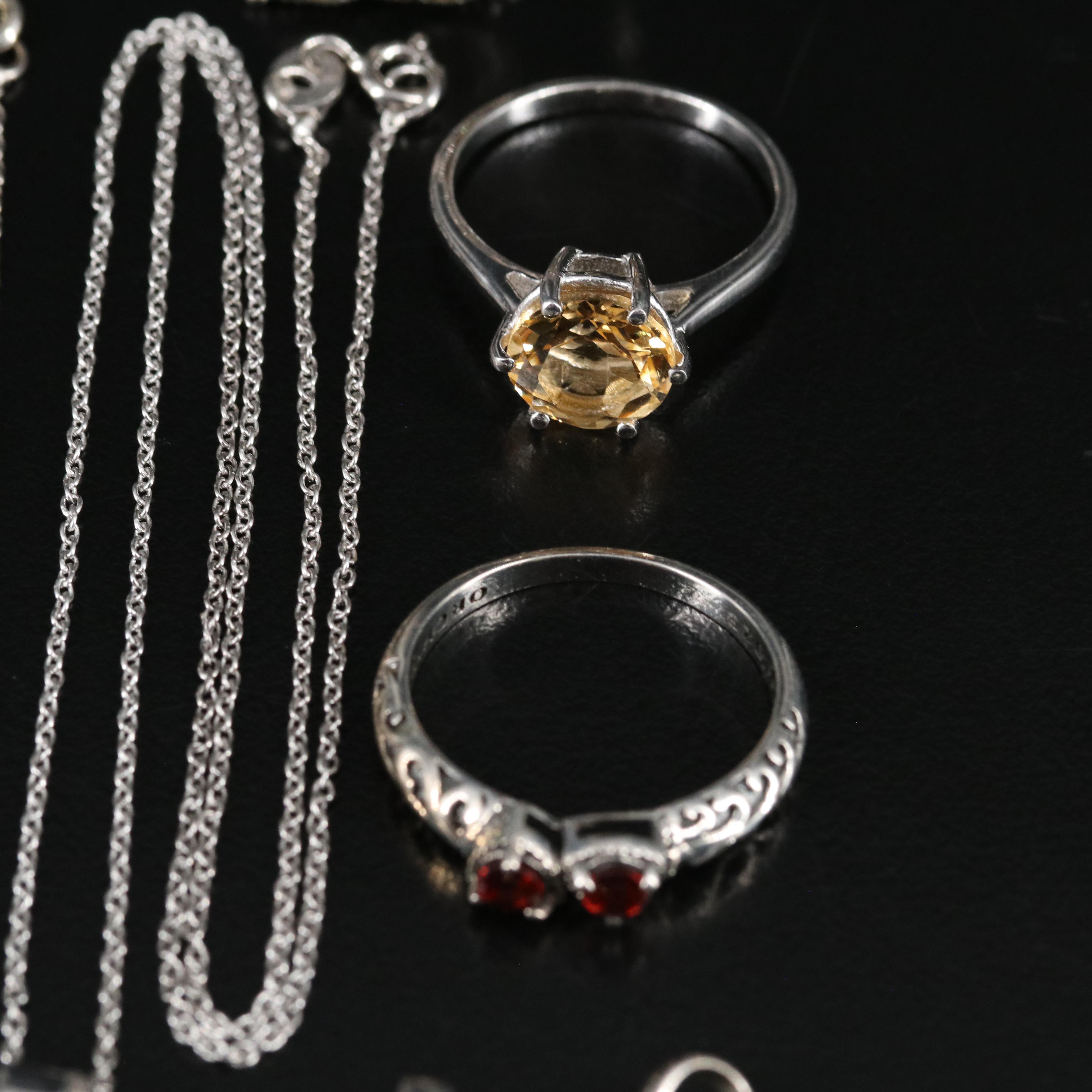 14 Assorted Sterling Silver Rings, Necklaces, Earrings, and Pendants