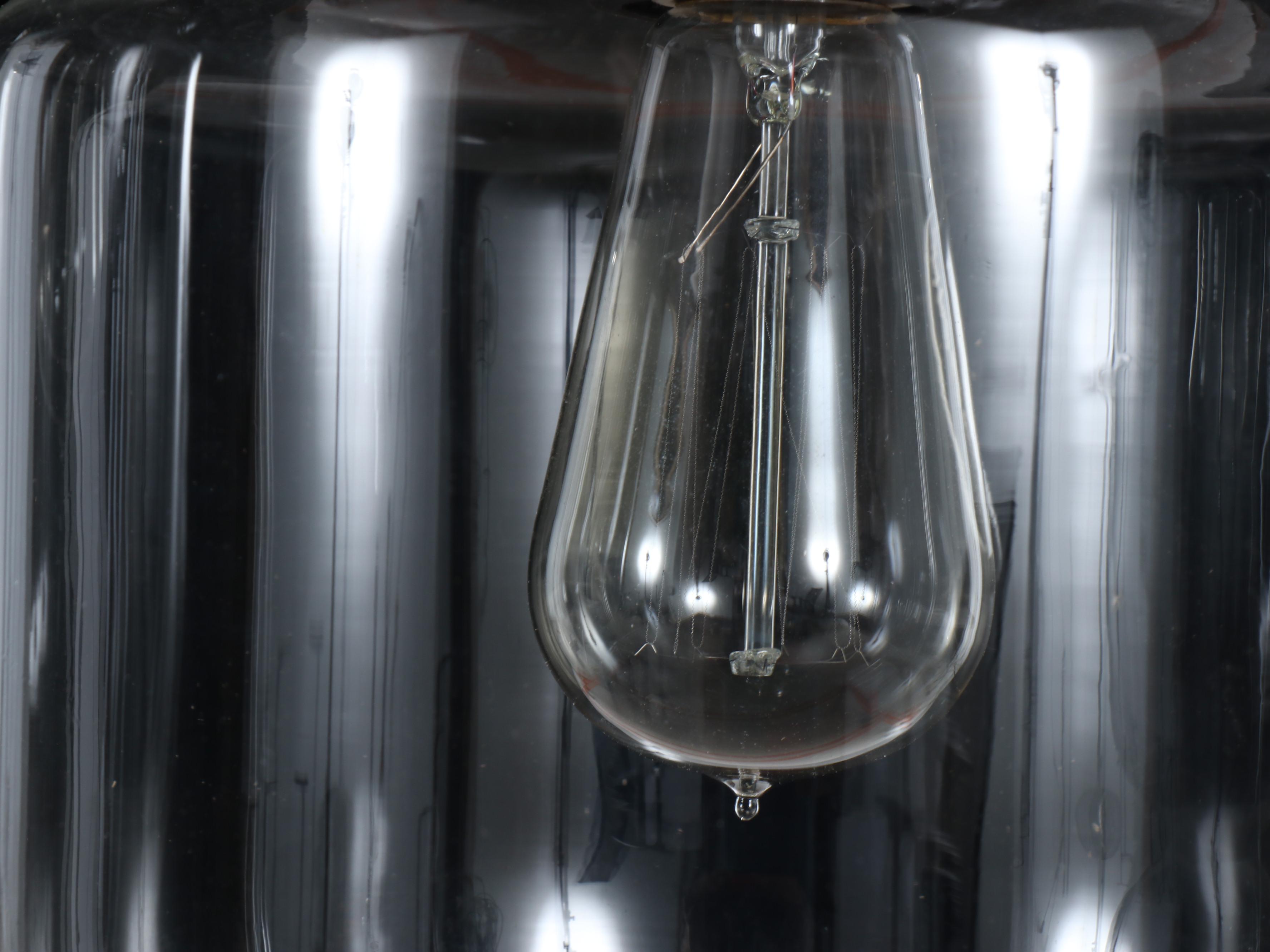 Pair of Oil Rubbed Bronze and Glass Pendant Lights