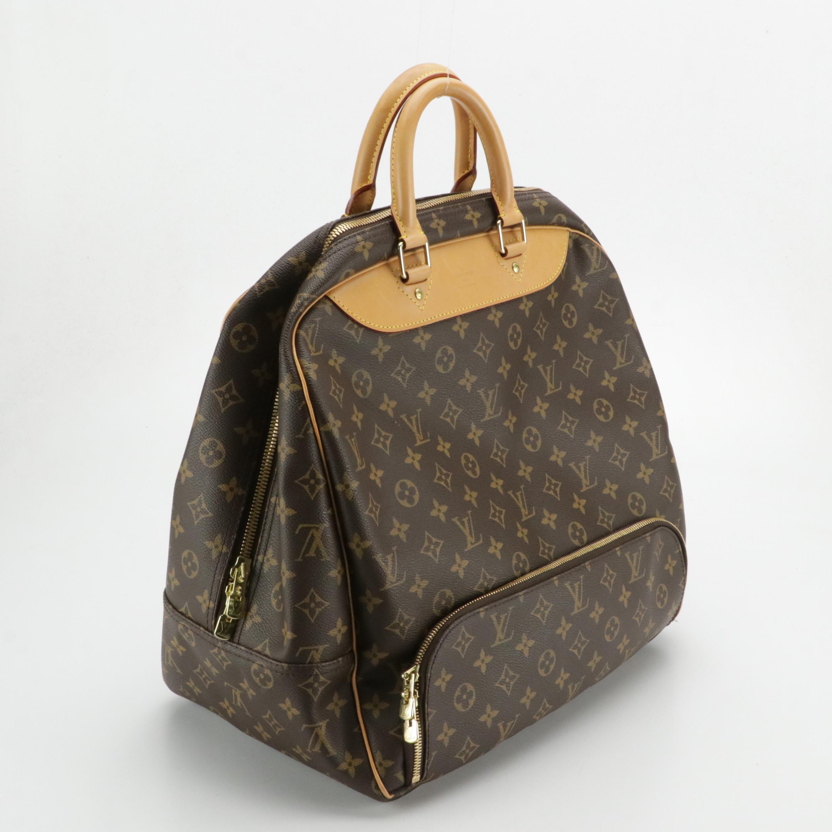 Louis Vuitton Evasion Travel Bag in Monogram Canvas and Vachetta Leather