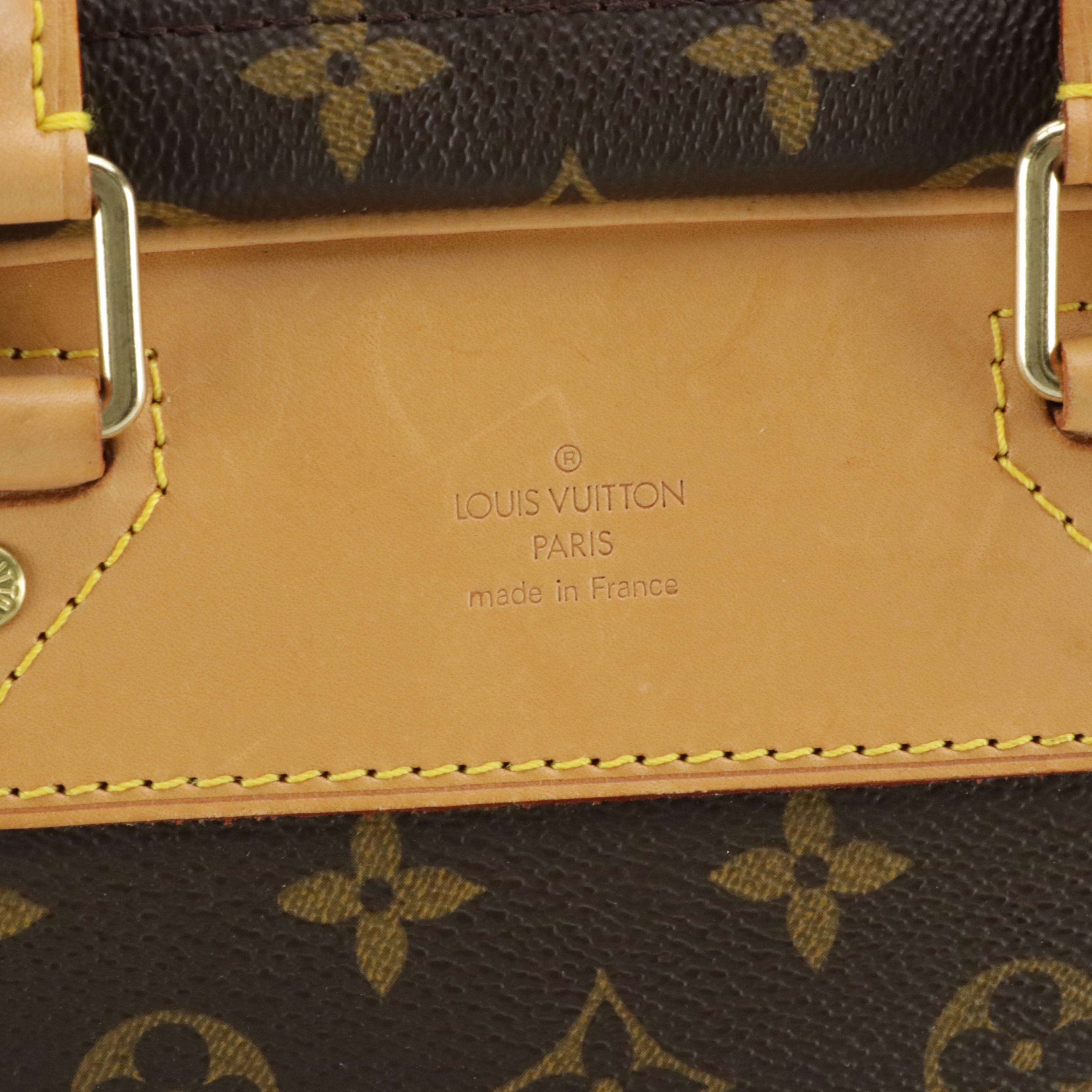 Louis Vuitton Evasion Travel Bag in Monogram Canvas and Vachetta Leather