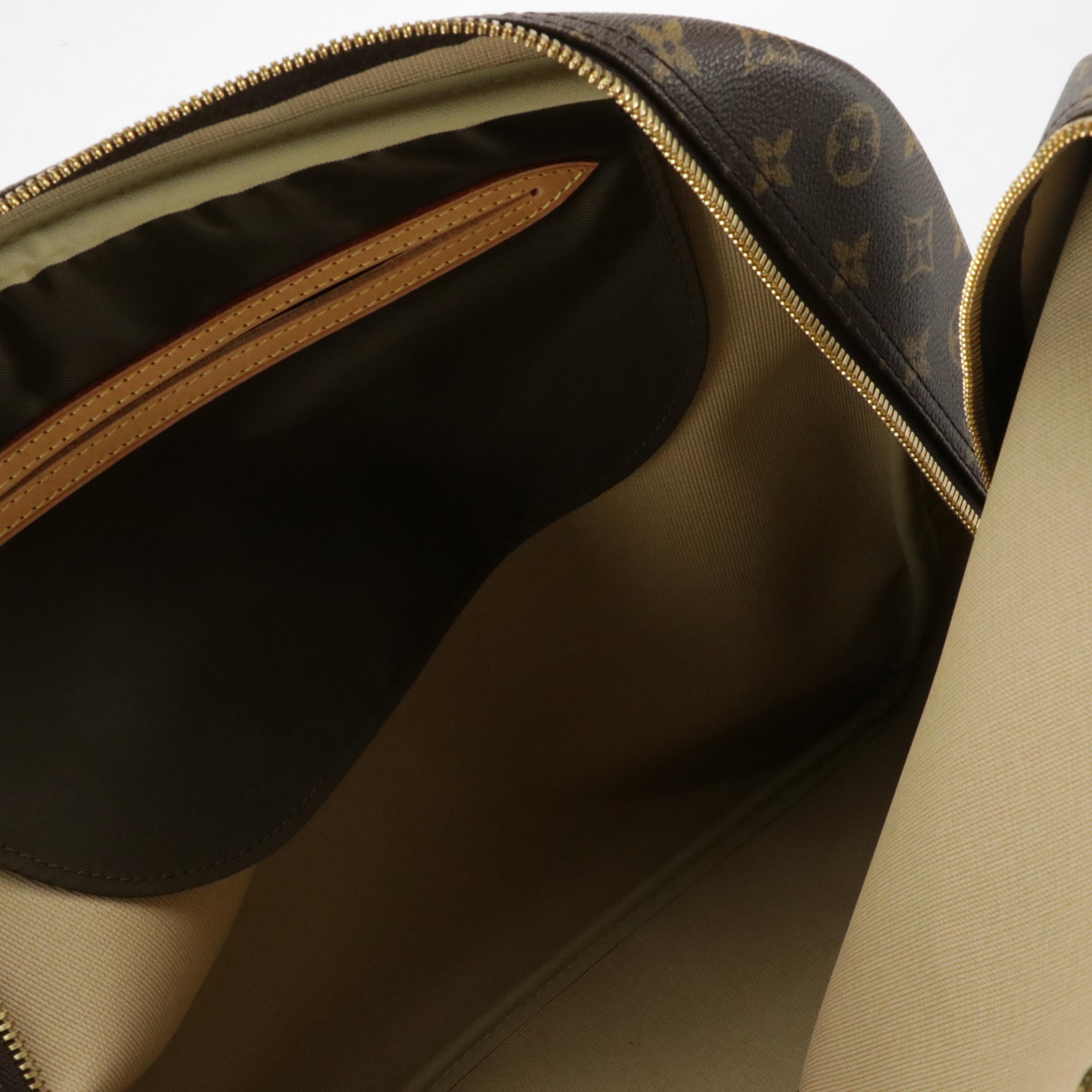 Louis Vuitton Evasion Travel Bag in Monogram Canvas and Vachetta Leather