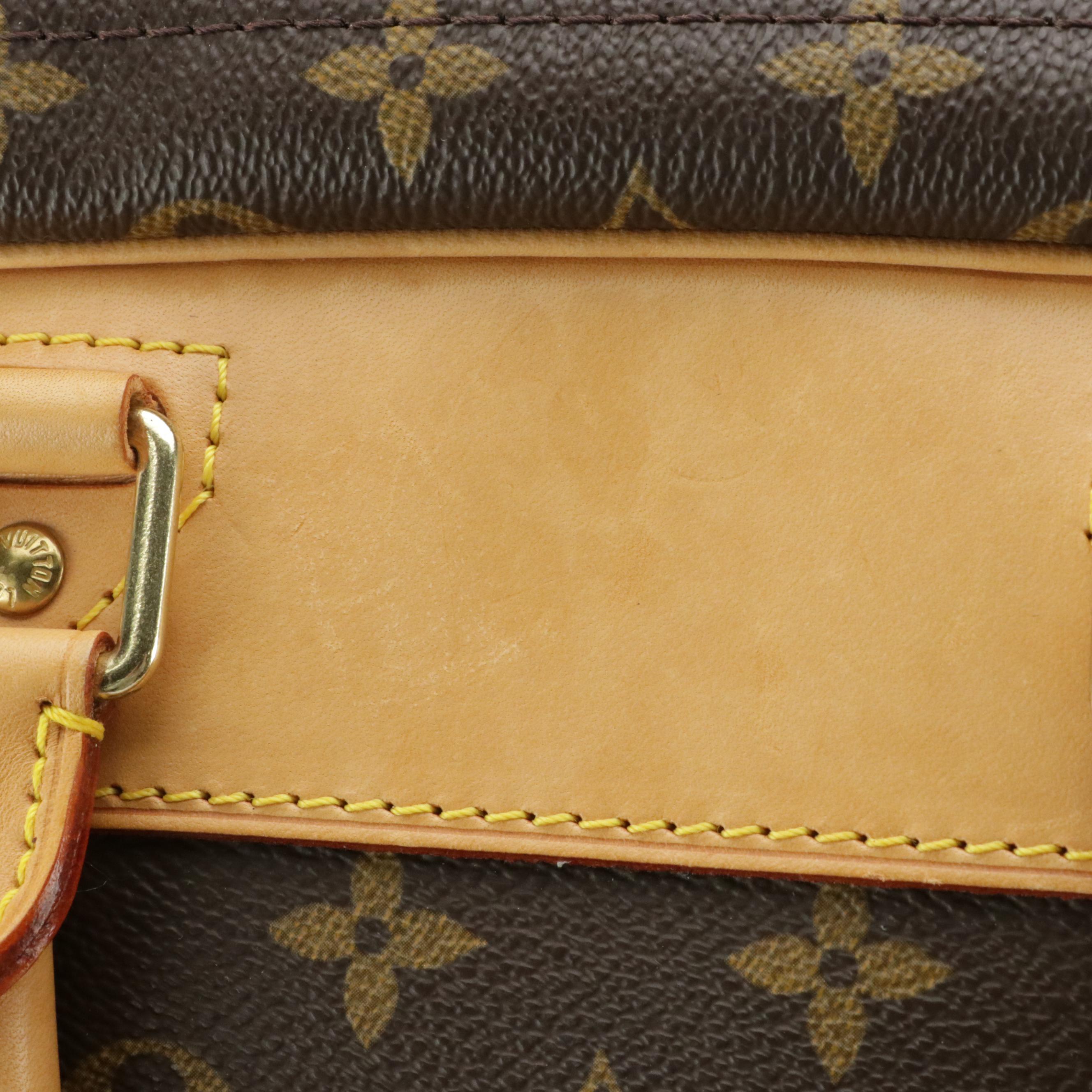 Louis Vuitton Evasion Travel Bag in Monogram Canvas and Vachetta Leather