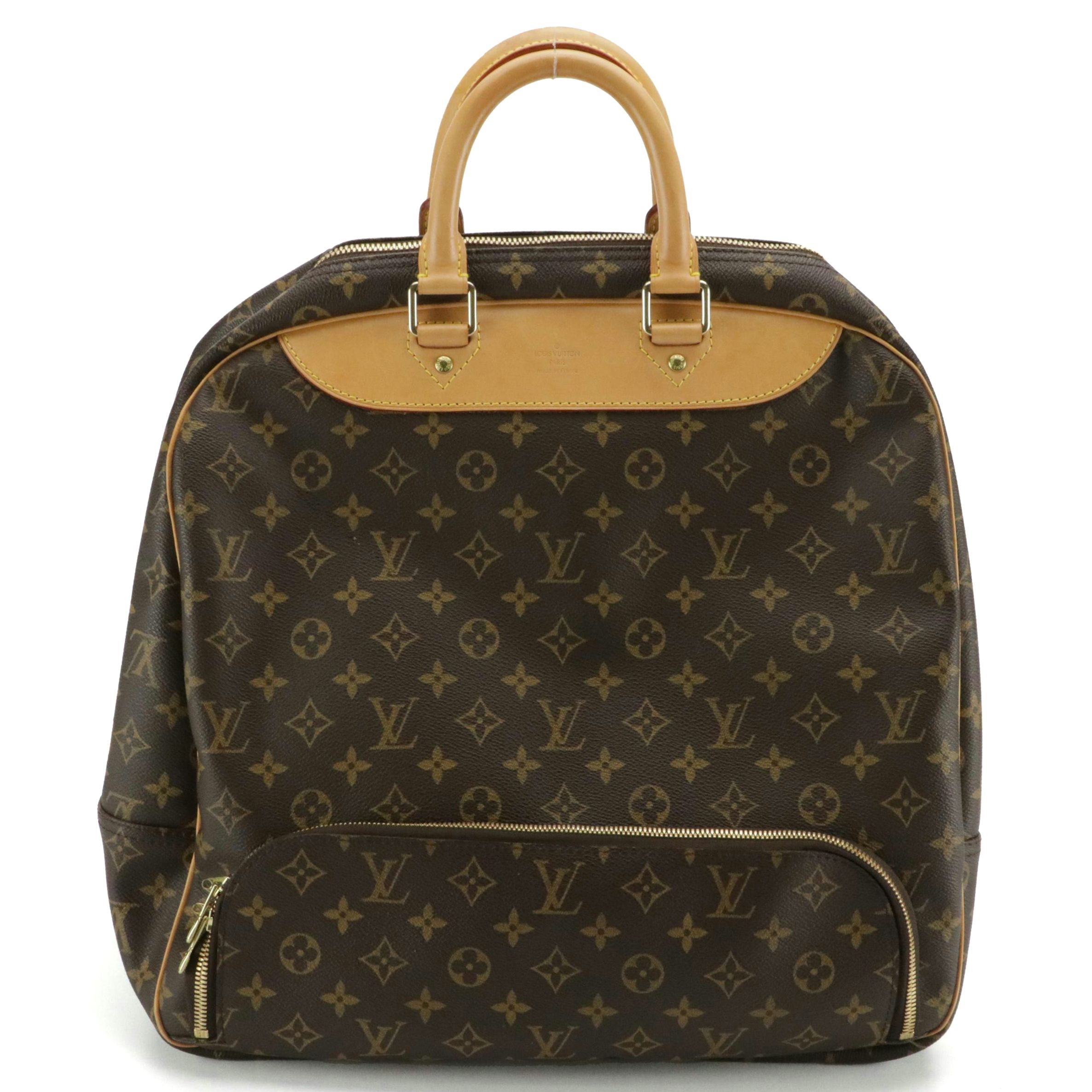 Louis Vuitton Evasion Travel Bag in Monogram Canvas and Vachetta Leather