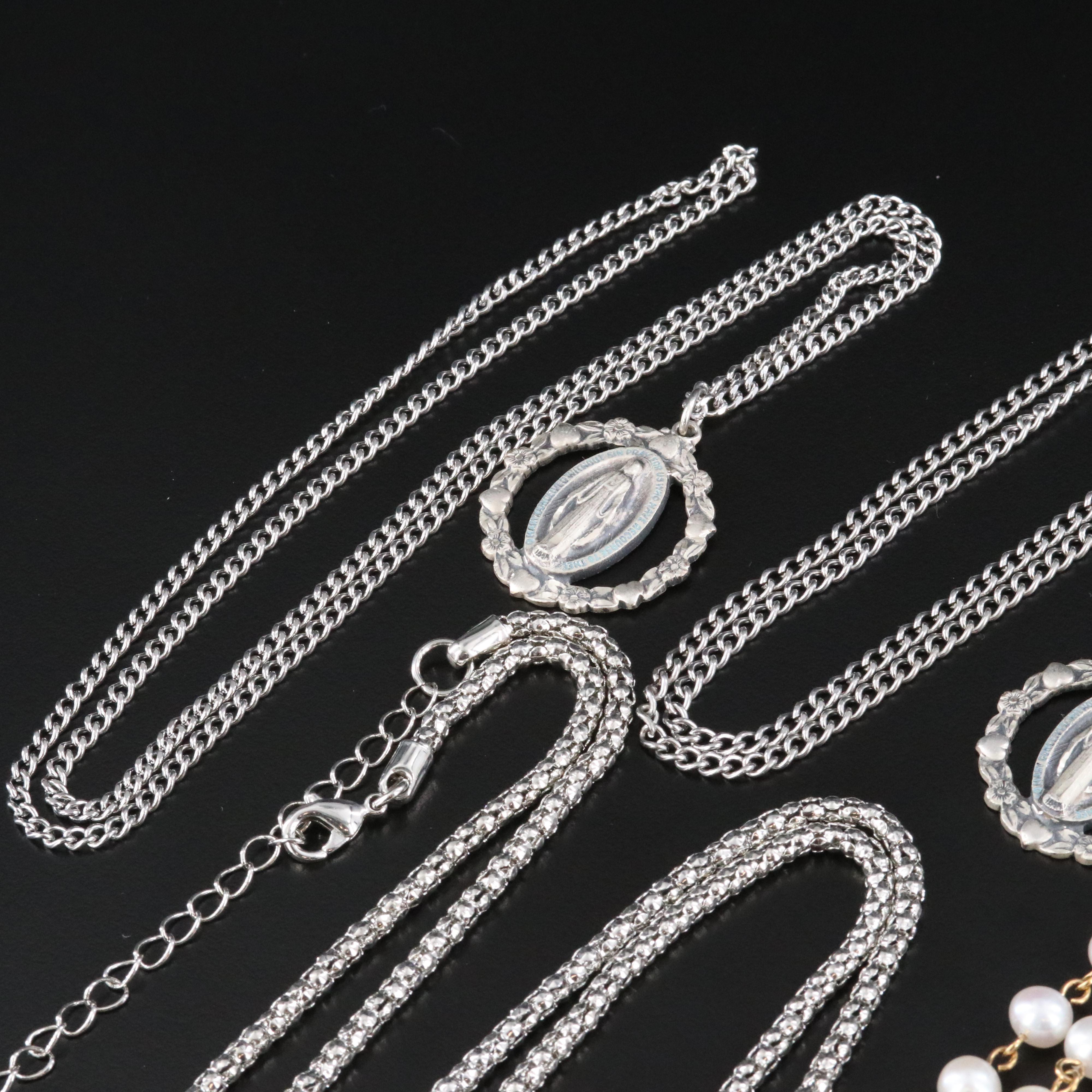 The Vatican Library Collection and Creed and Sterling Featured in Necklaces