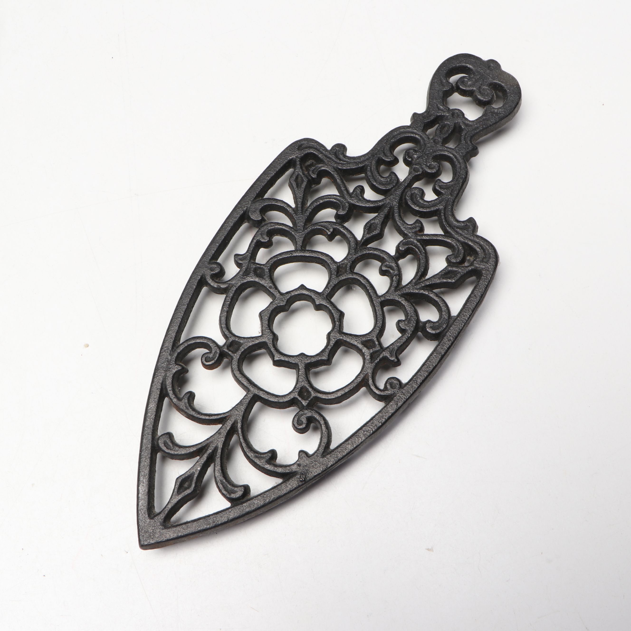 Cast Iron Trivets and Bootjack with Candleholder and More Metalware