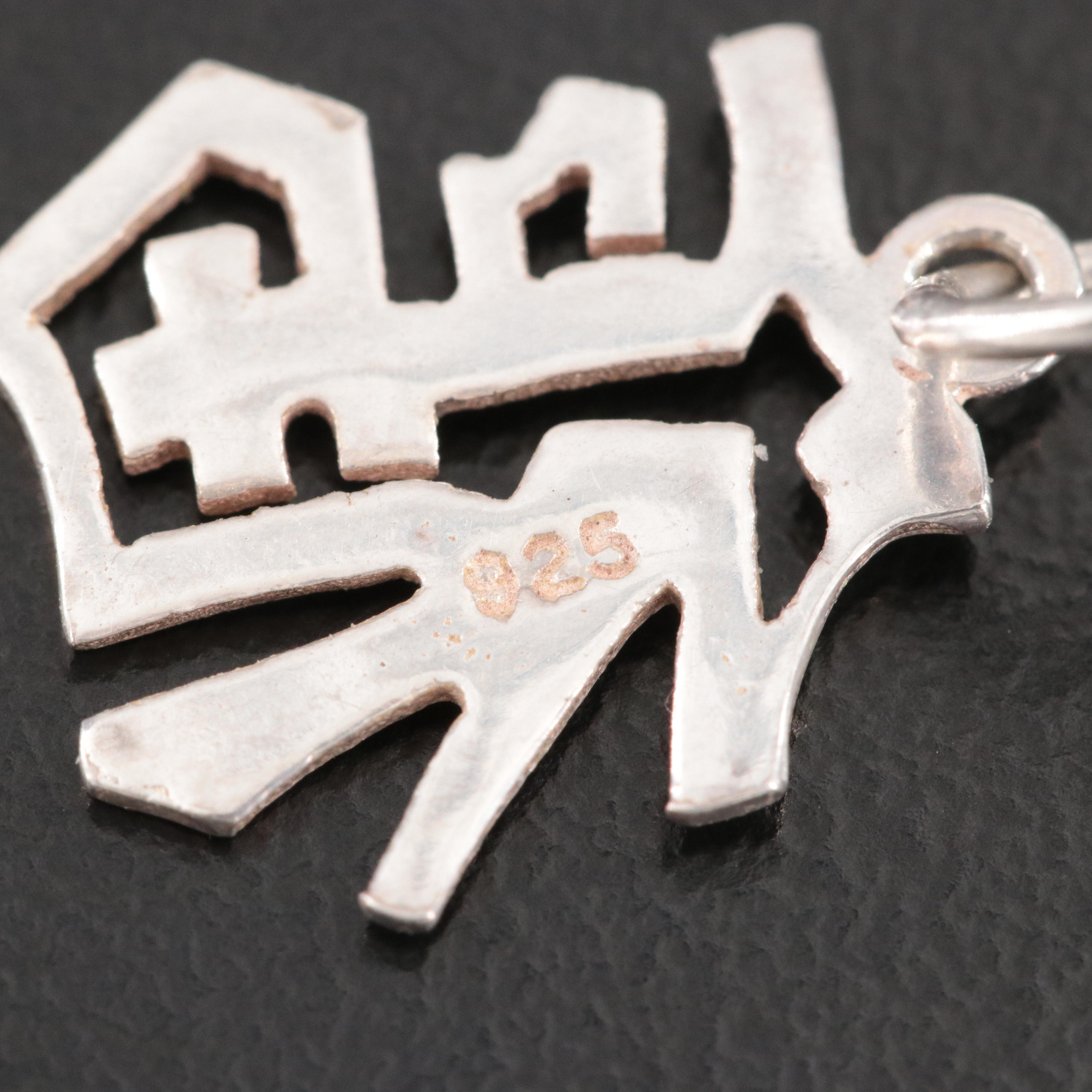 Sterling "Good Fortune" Charm