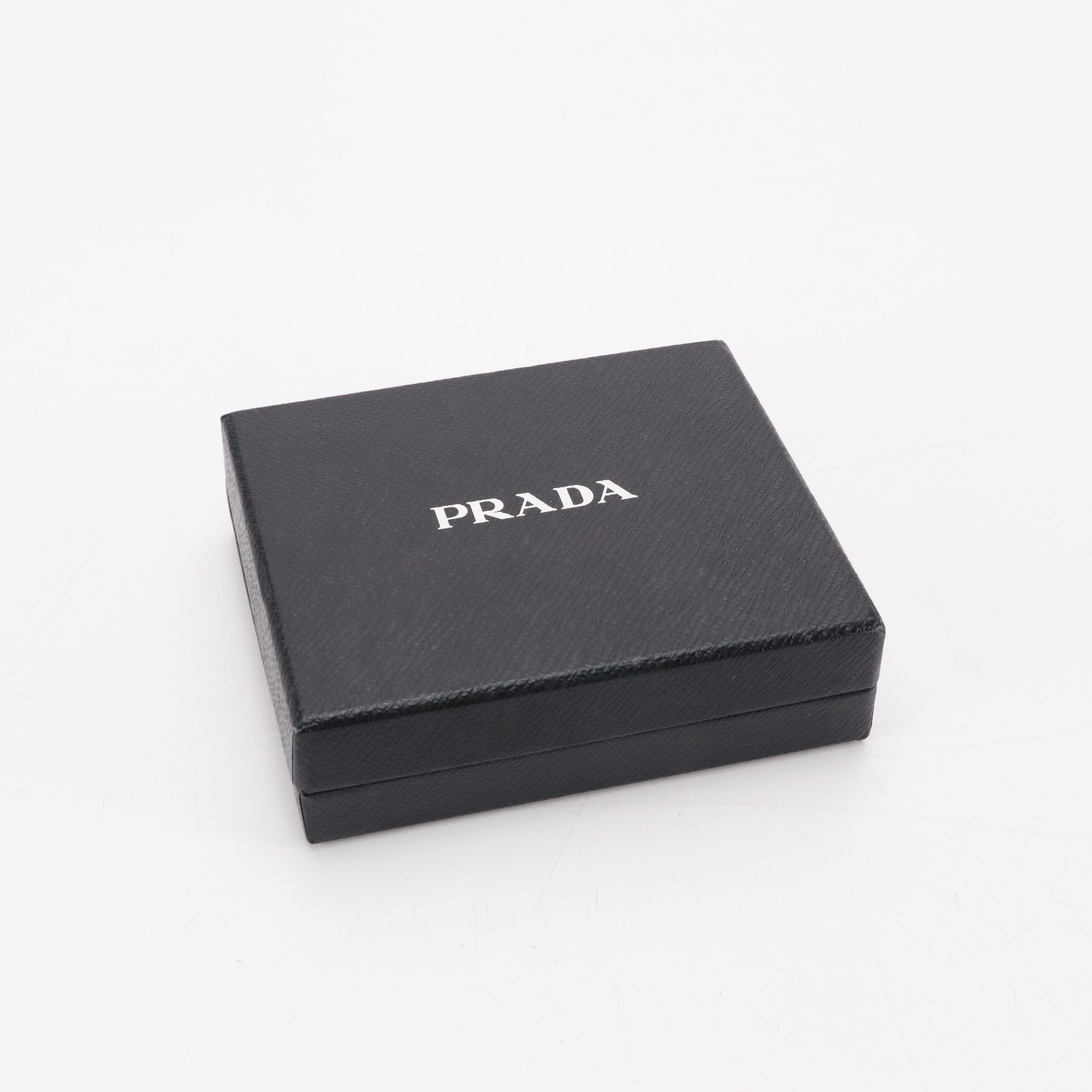 Prada Skull & Crossbones Embellished Bifold Wallet in Saffiano Leather, With Box