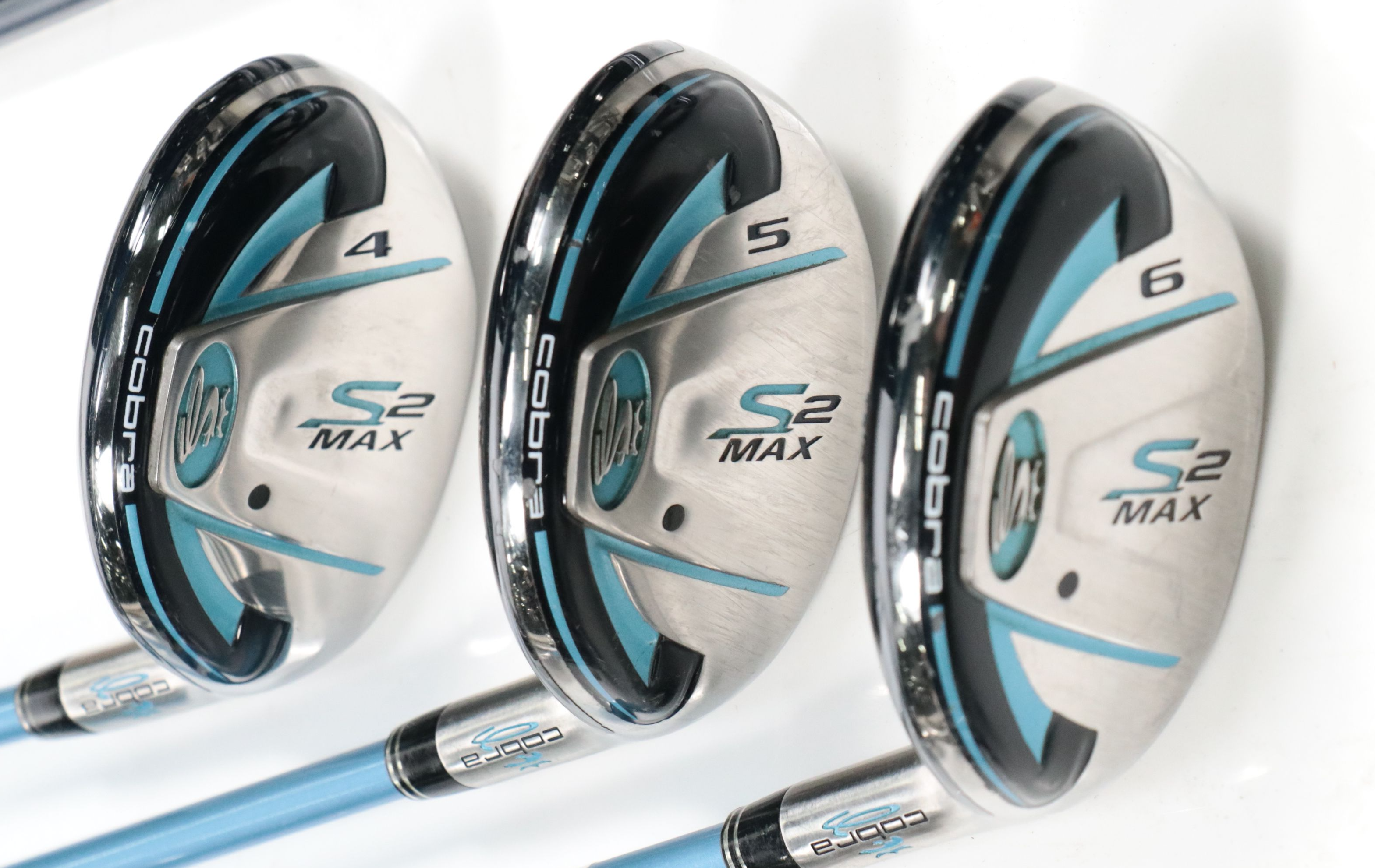 Cobra Golf Clubs, Daiwa Leather Golf Bag, and More Golf Accessoried