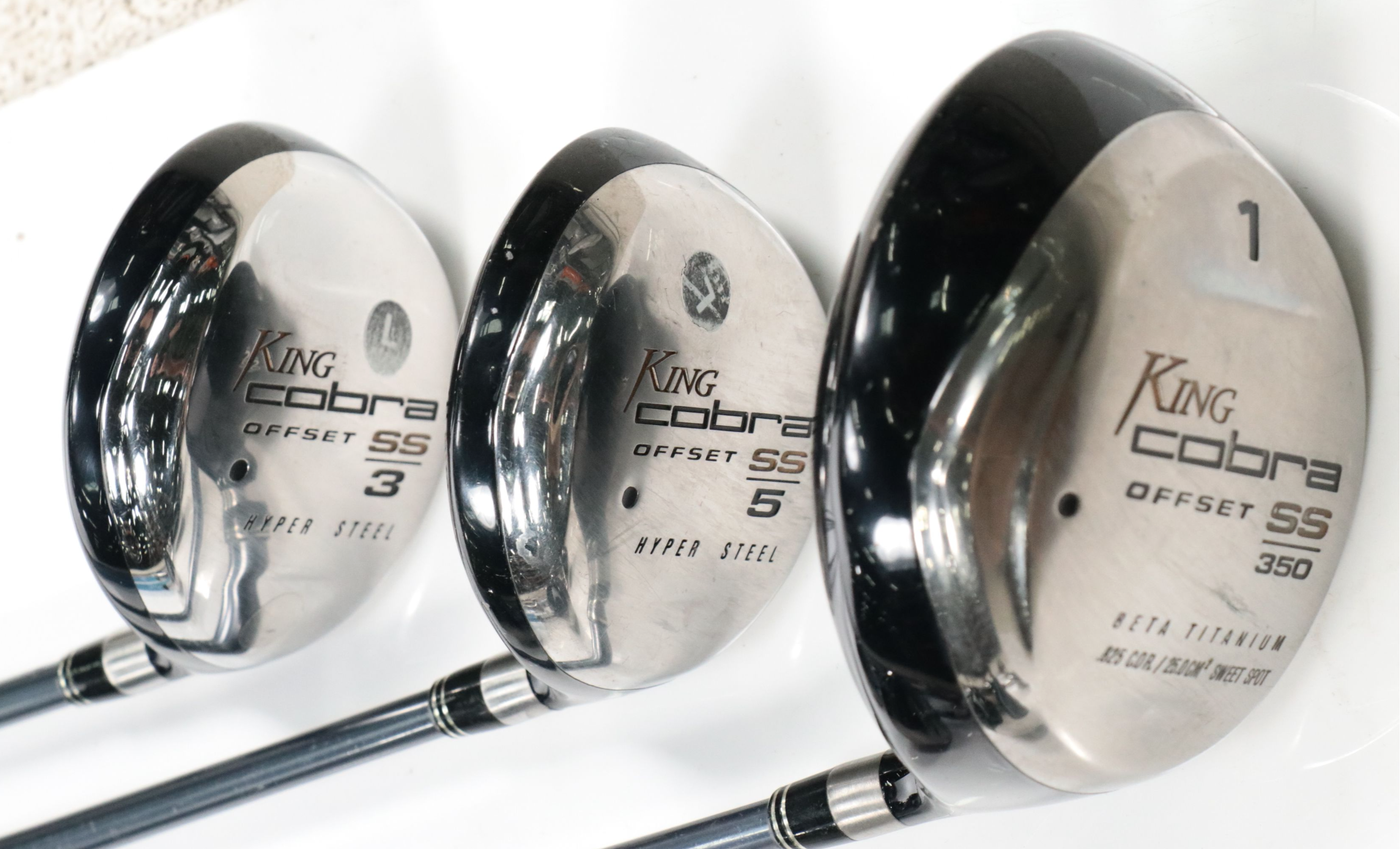 Cobra Golf Clubs, Daiwa Leather Golf Bag, and More Golf Accessoried