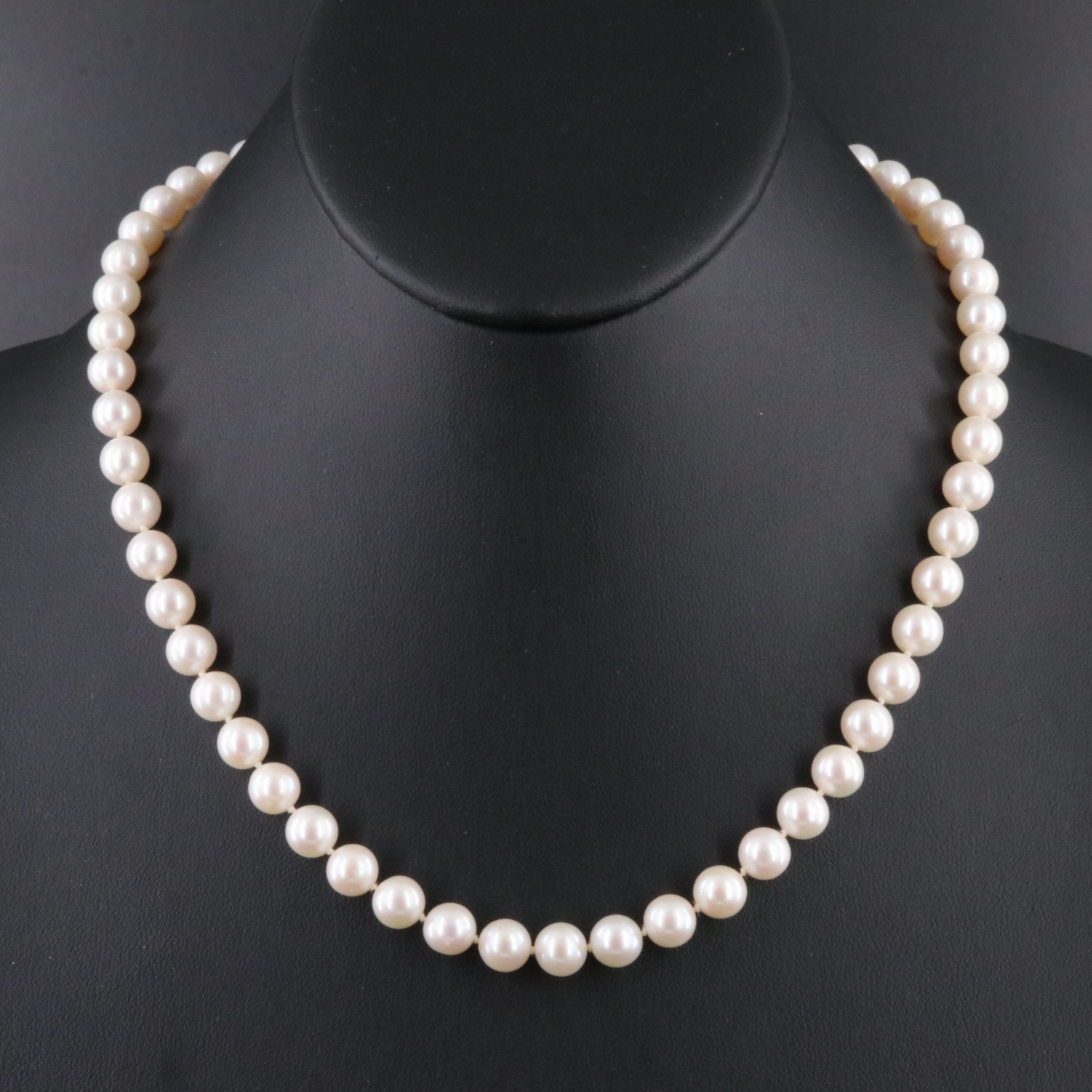 Pearl Necklace with 14K Shell Clasp