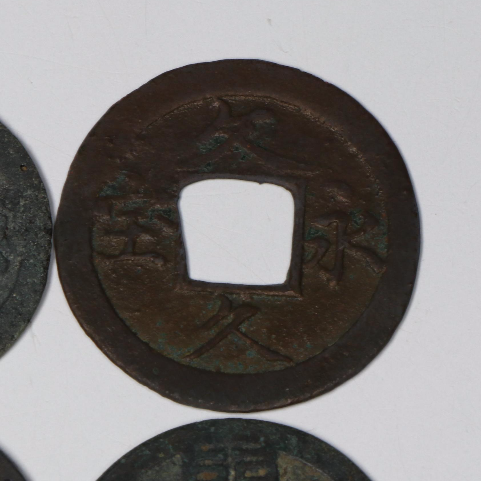 Antique Group of Four Chinese Cash Coins from the Qing and Tang Dynasties