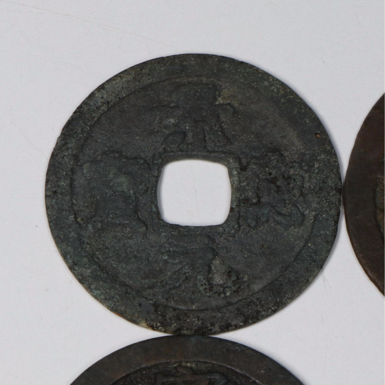 Antique Group of Four Chinese Cash Coins from the Qing and Tang Dynasties