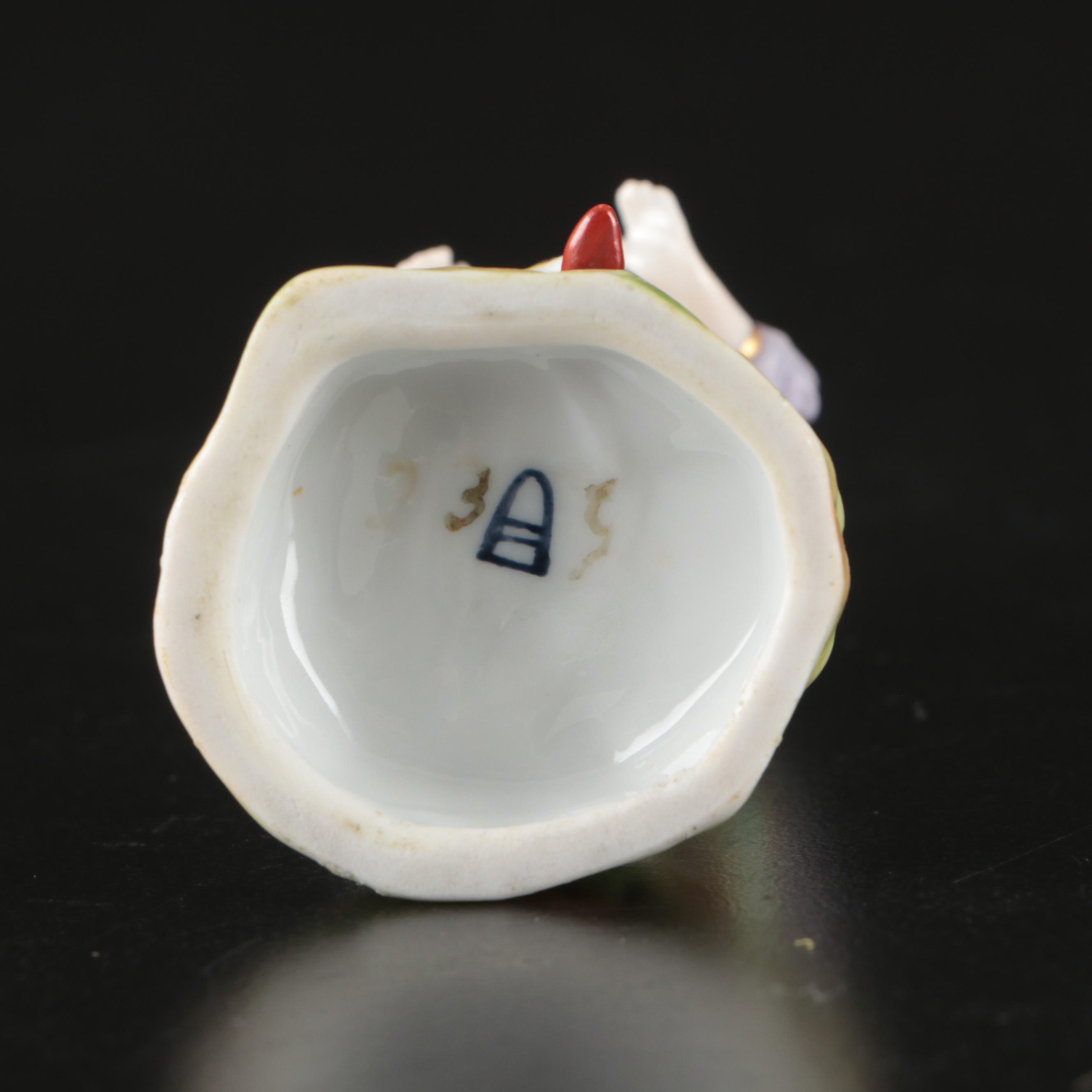 Pair of Sevres Style Bisque Figurine Vases with Royal Vienna Porcelain Figurines