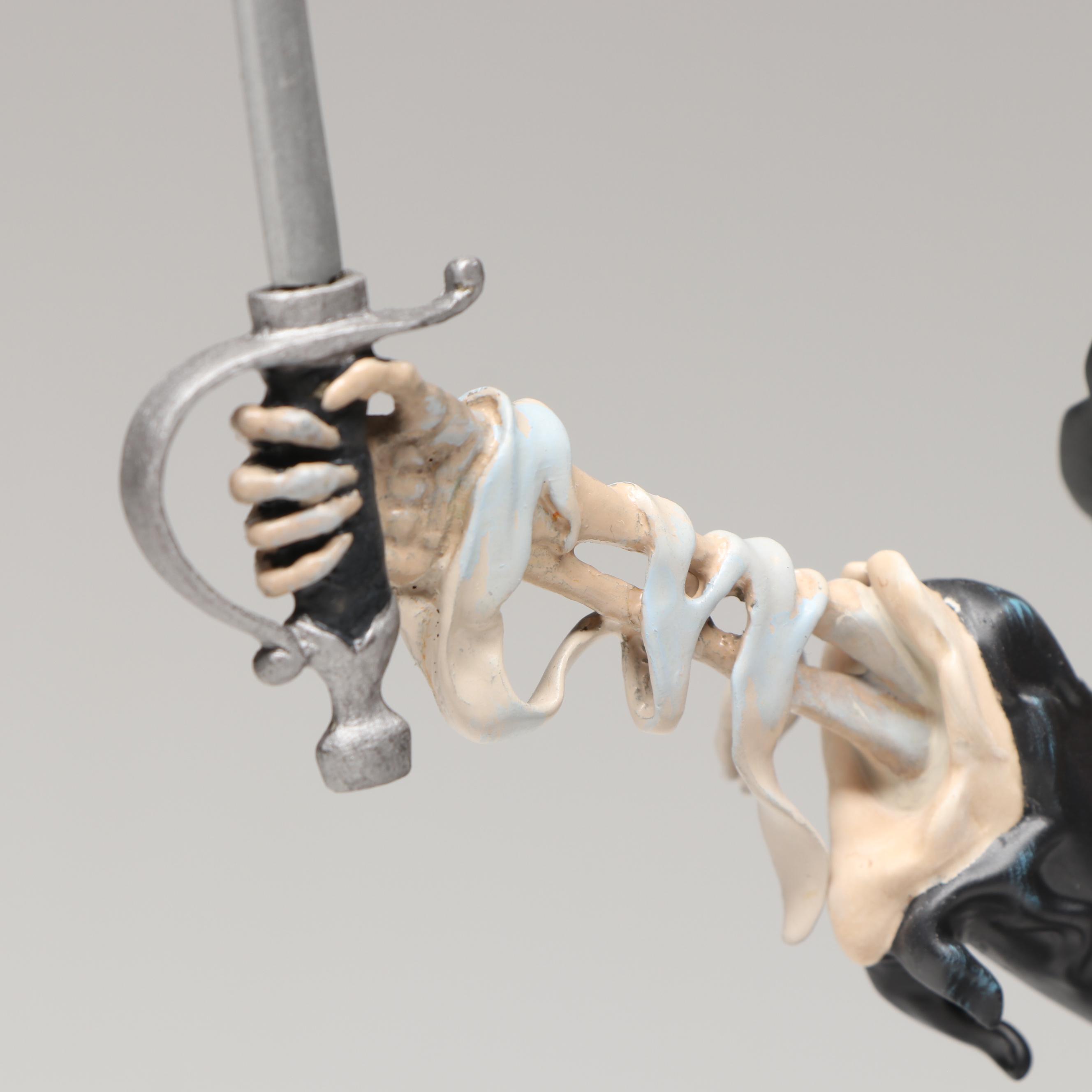 Disney "Swashbuckling Scoundrel"  and "Black-Hearted Brigand" Porcelain Figures