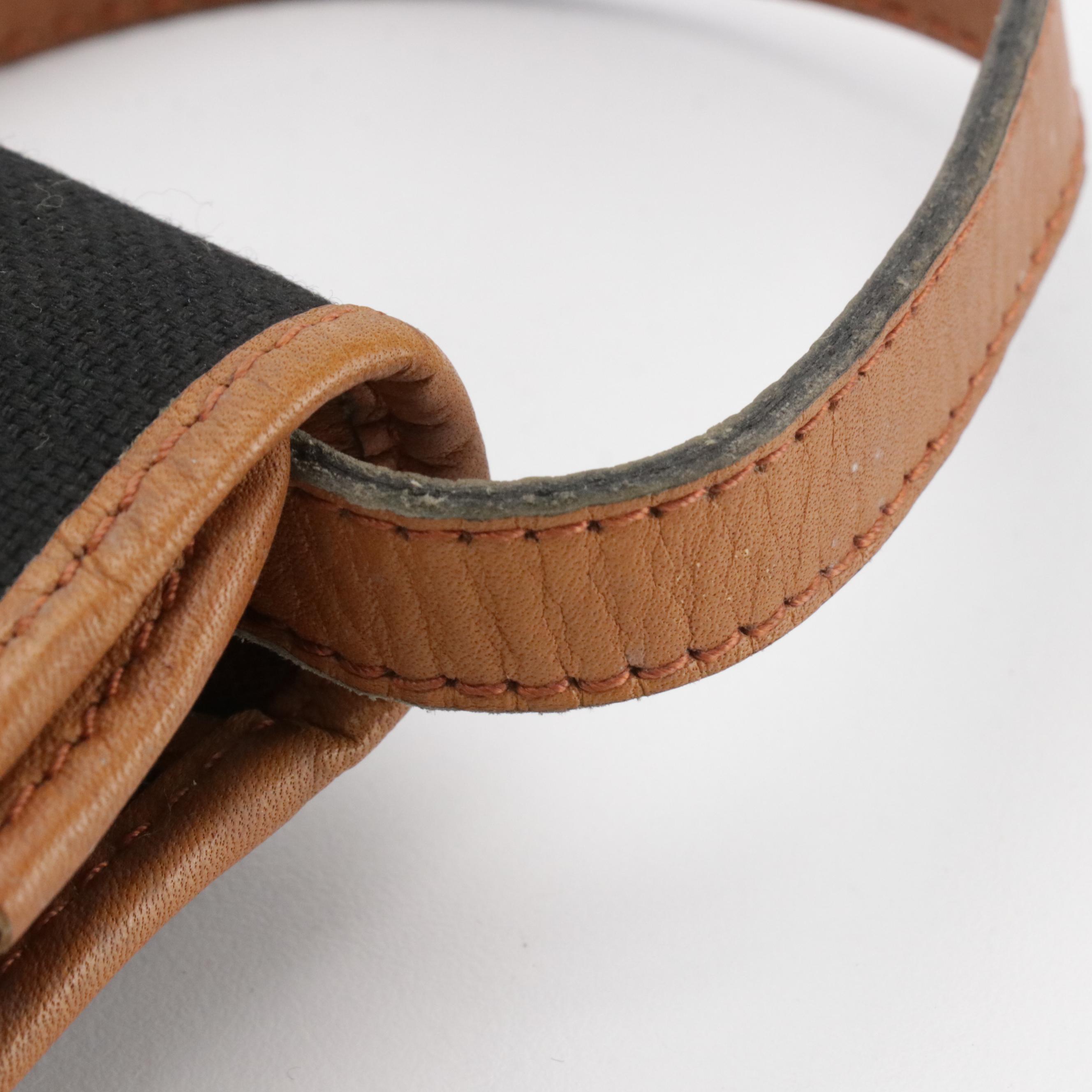 Yves Saint Laurent Convertible Clutch in Canvas and Leather