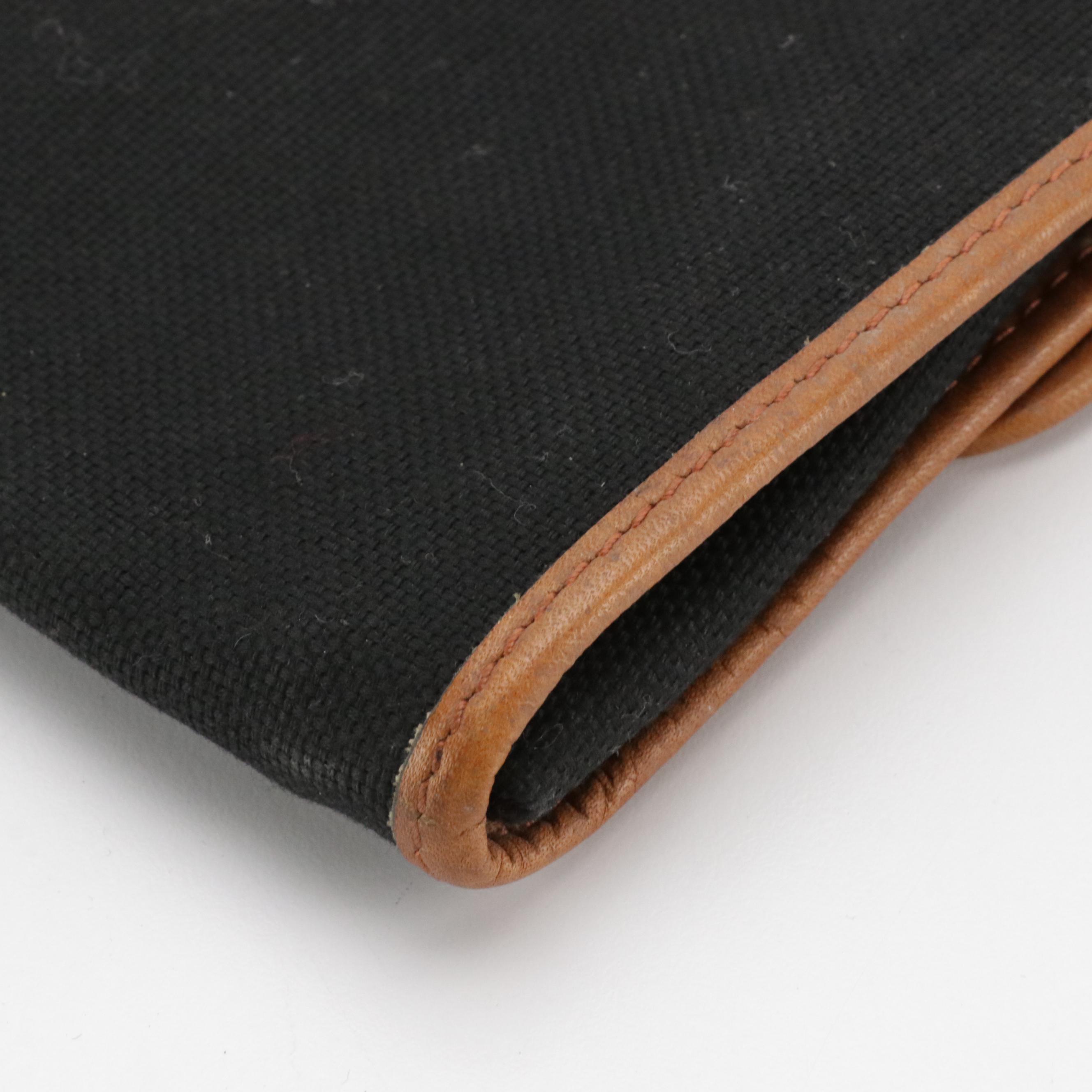 Yves Saint Laurent Convertible Clutch in Canvas and Leather