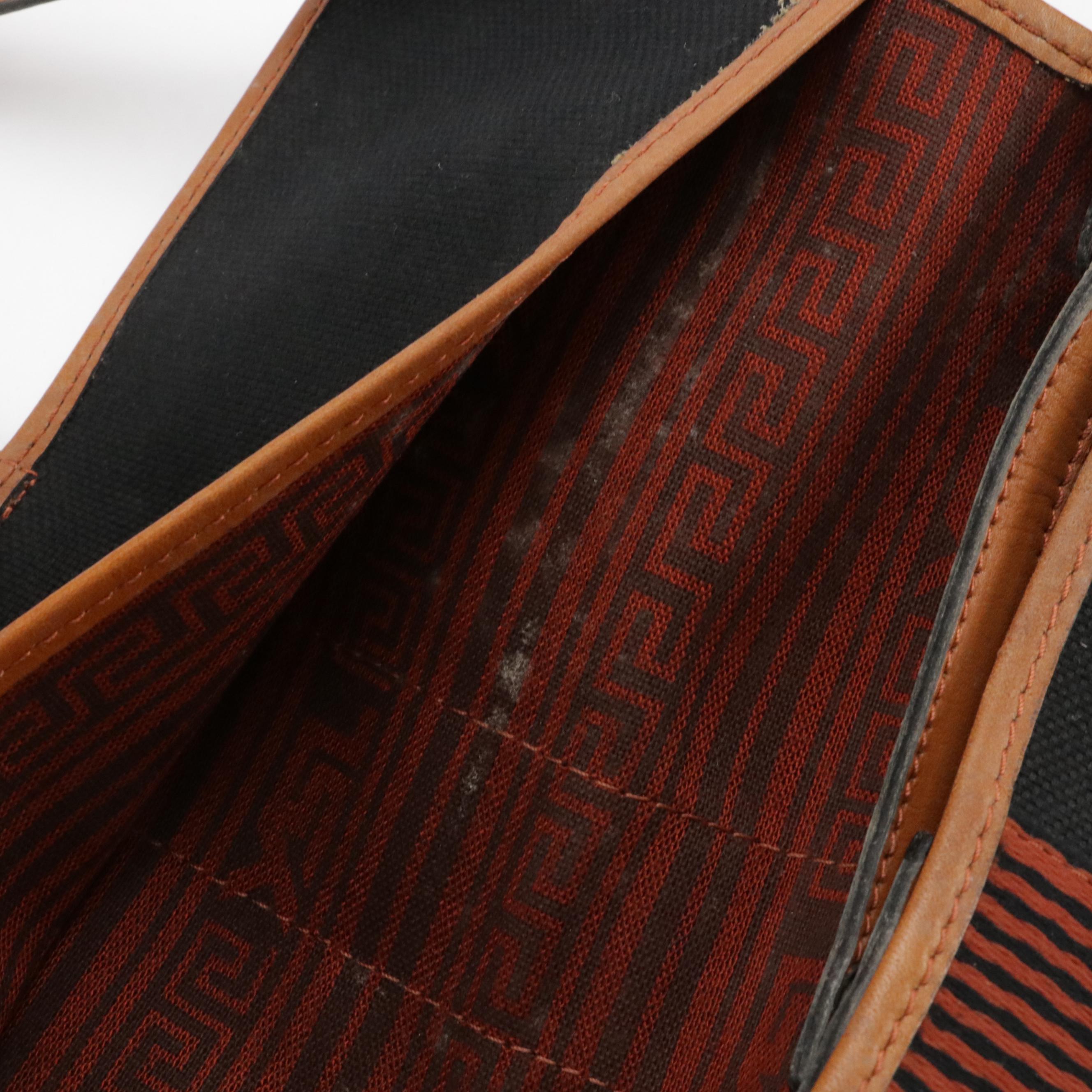 Yves Saint Laurent Convertible Clutch in Canvas and Leather