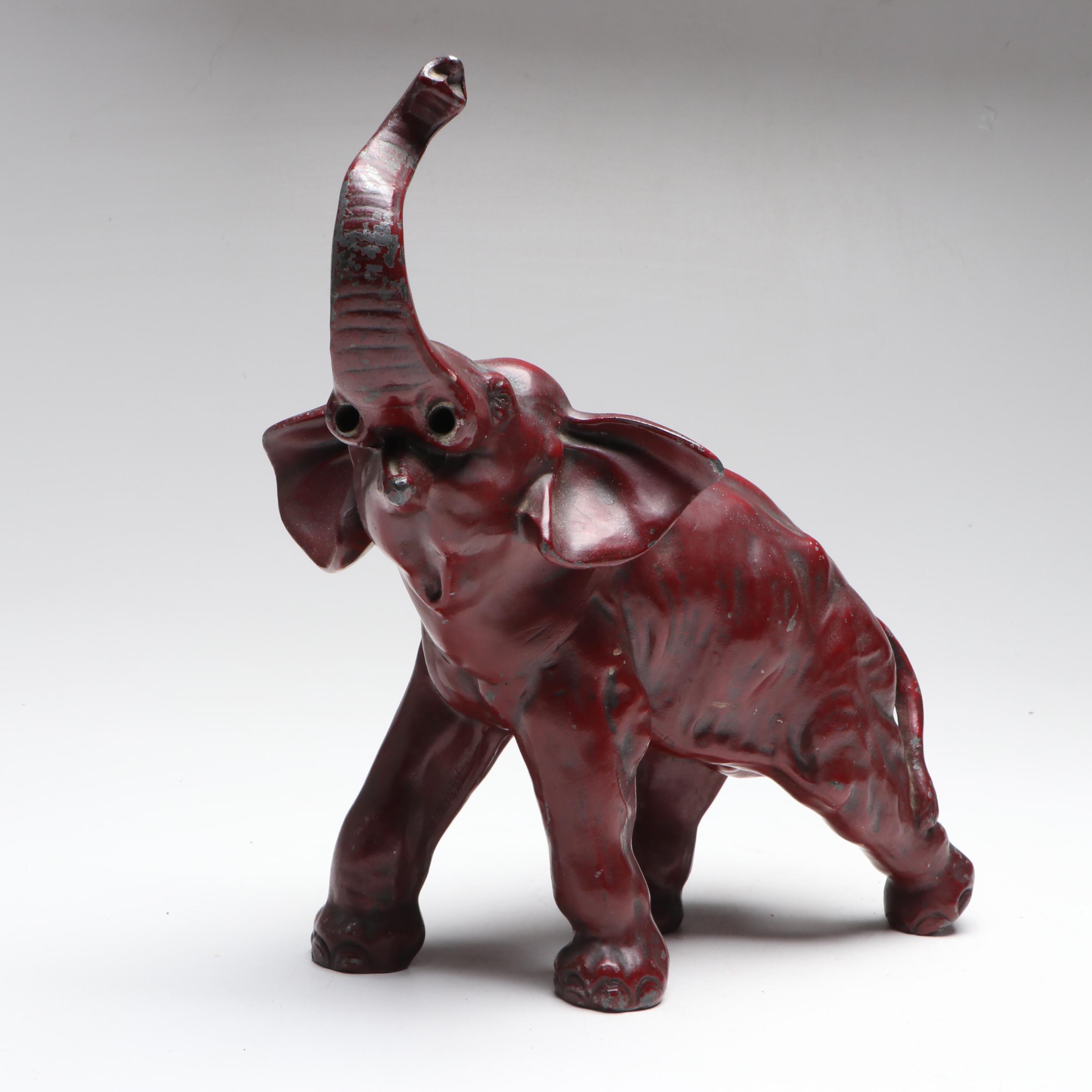 Red Cast Metal Elephant with Raised Trunk, Early to Mid-20th Century