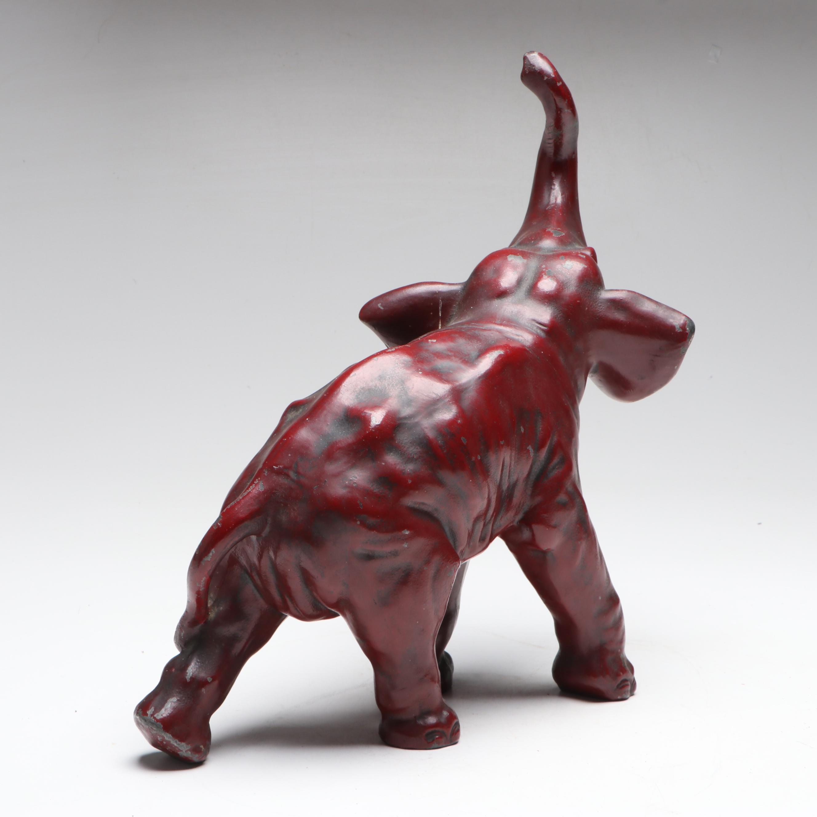Red Cast Metal Elephant with Raised Trunk, Early to Mid-20th Century