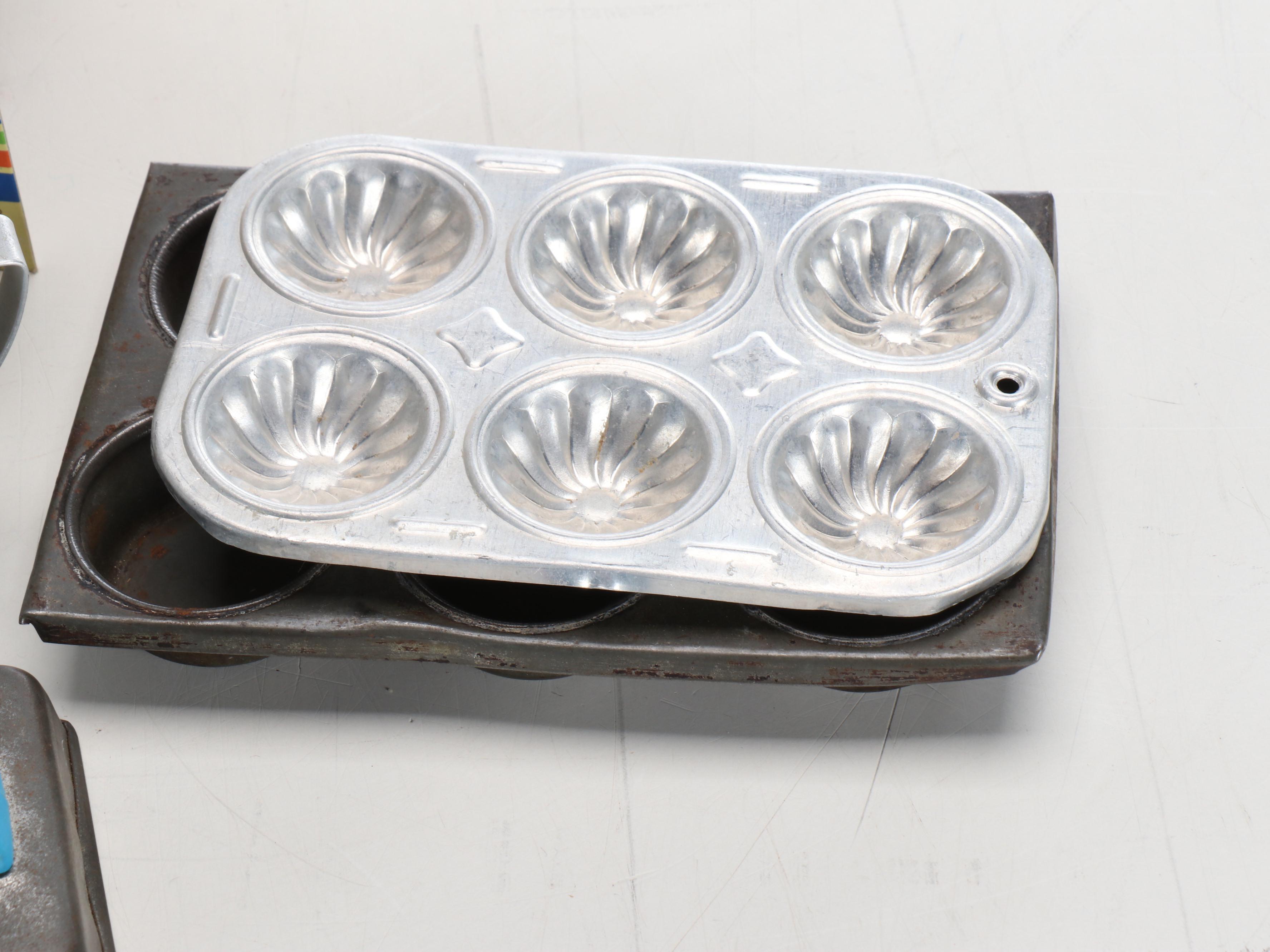 Children's Miniature Toy Kitchen Appliances and Dolls in Carriage