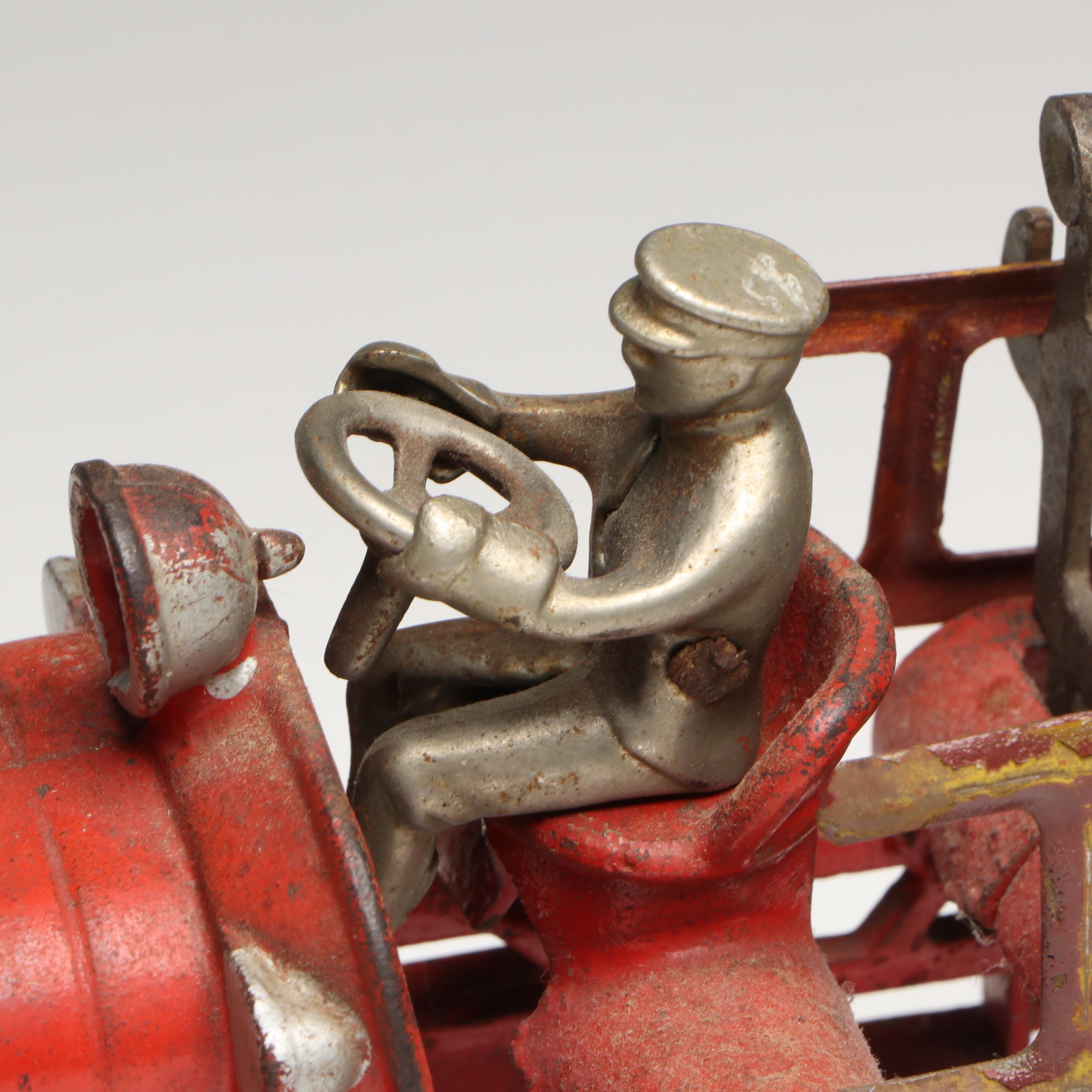 Hubley Cast Iron Cold-Painted Fire Ladder Truck with Driver, Early 20th Century