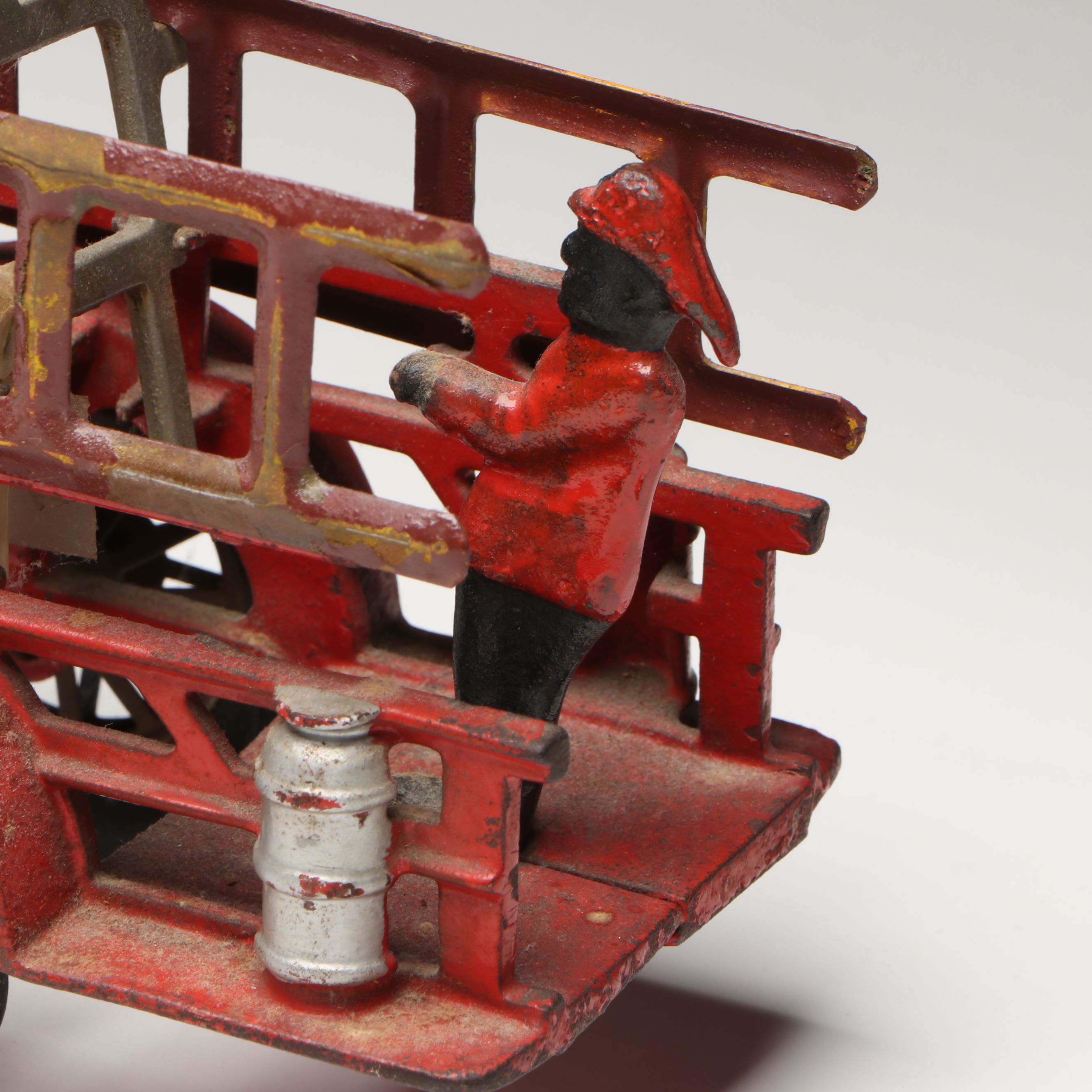 Hubley Cast Iron Cold-Painted Fire Ladder Truck with Driver, Early 20th Century
