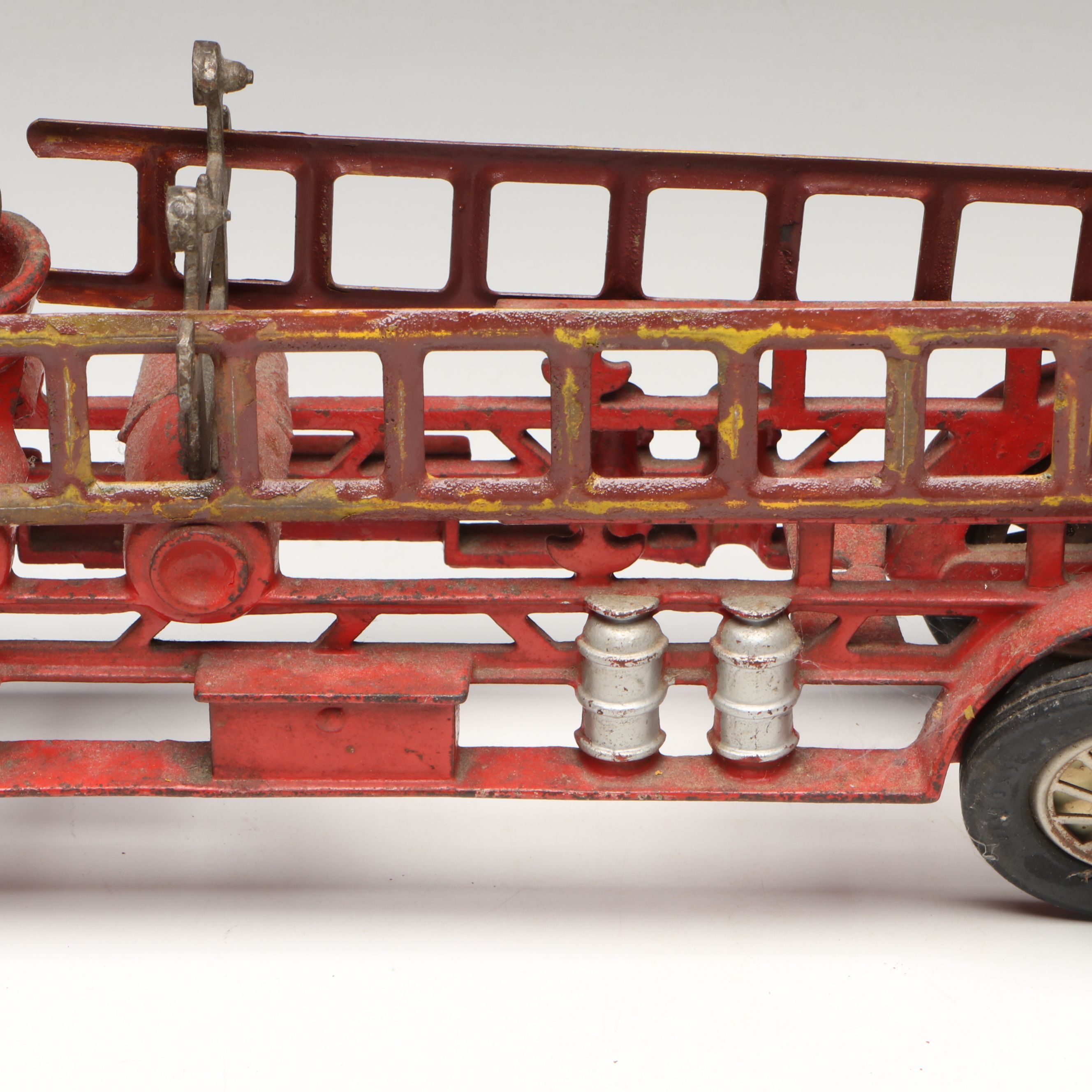 Hubley Cast Iron Cold-Painted Fire Ladder Truck with Driver, Early 20th Century