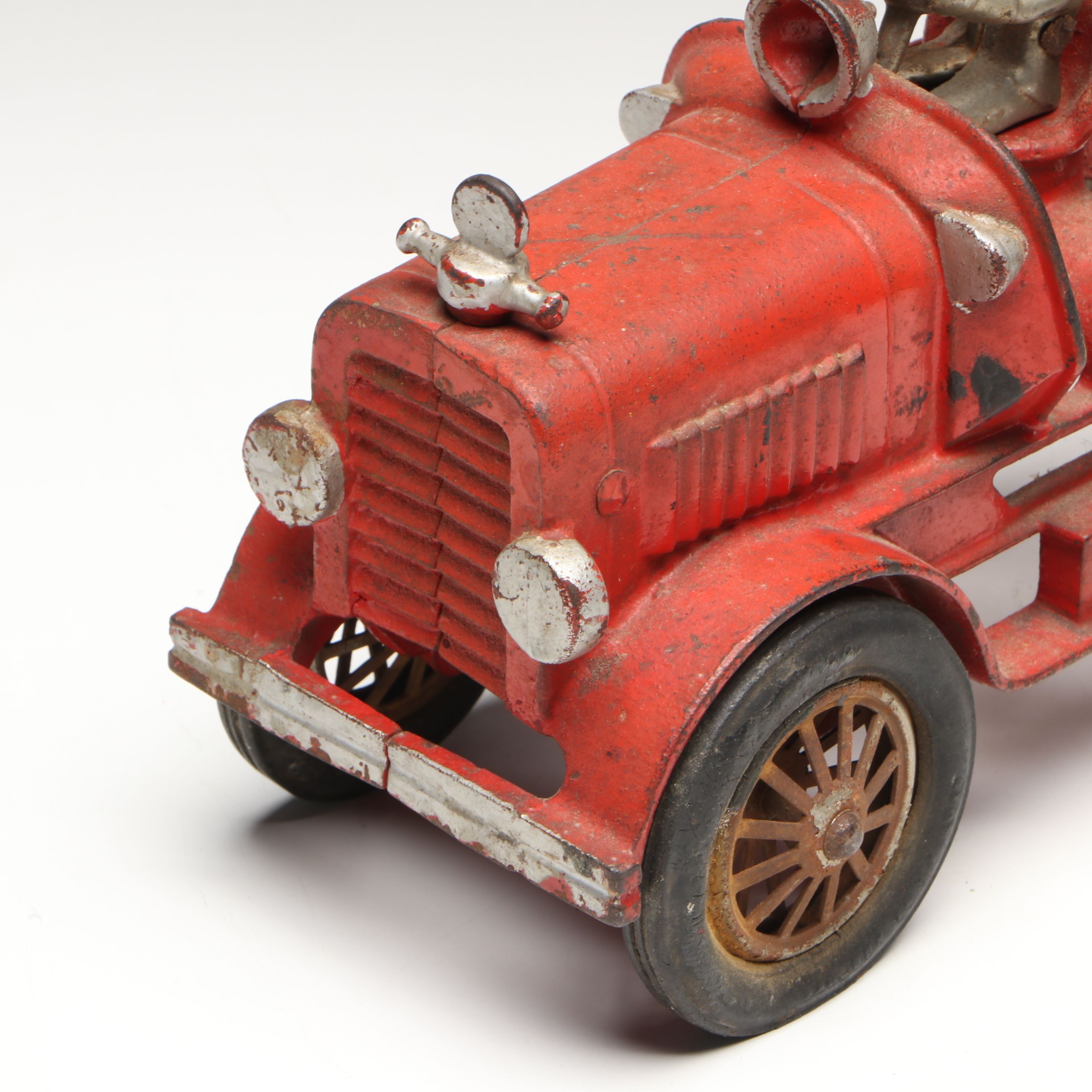 Hubley Cast Iron Cold-Painted Fire Ladder Truck with Driver, Early 20th Century