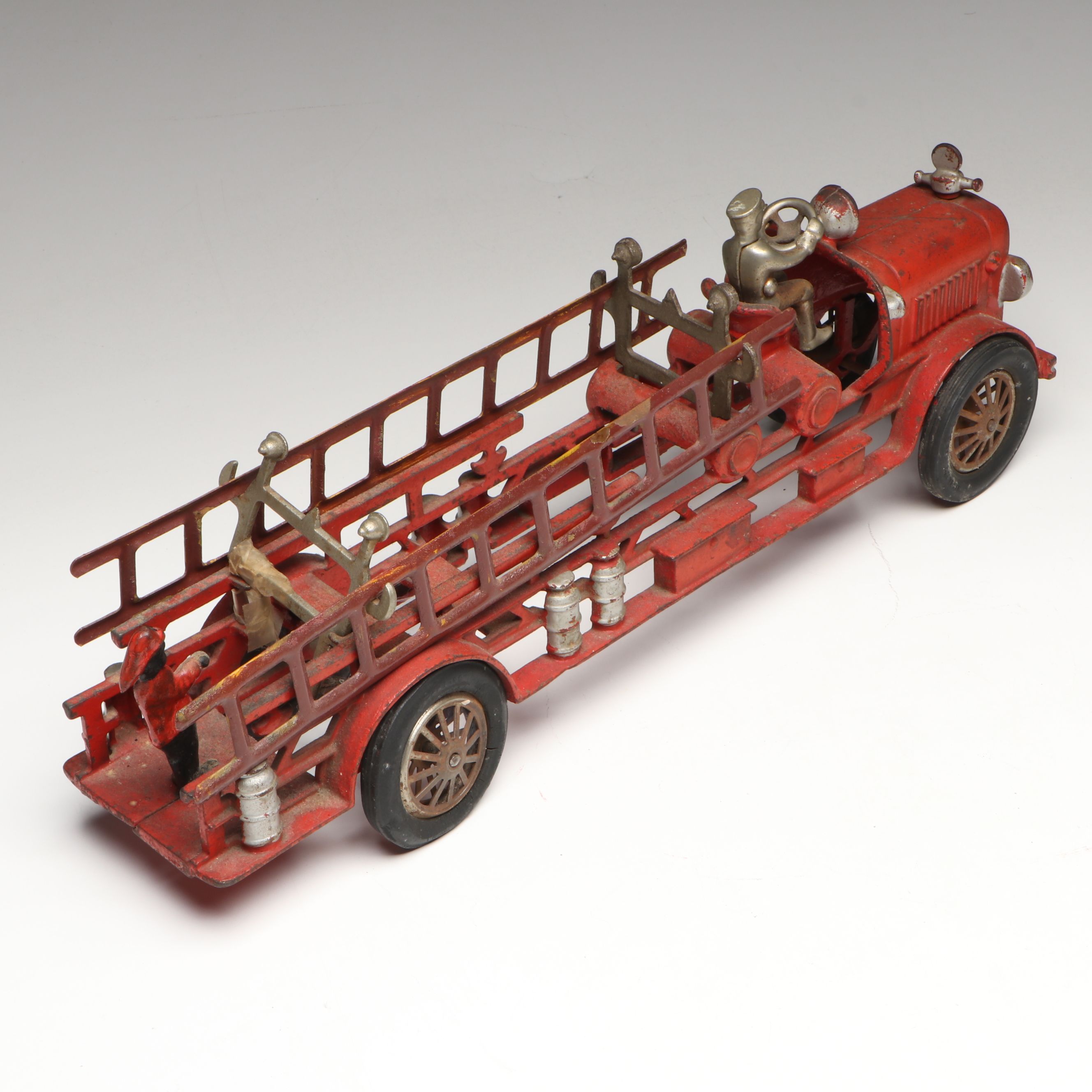 Hubley Cast Iron Cold-Painted Fire Ladder Truck with Driver, Early 20th Century