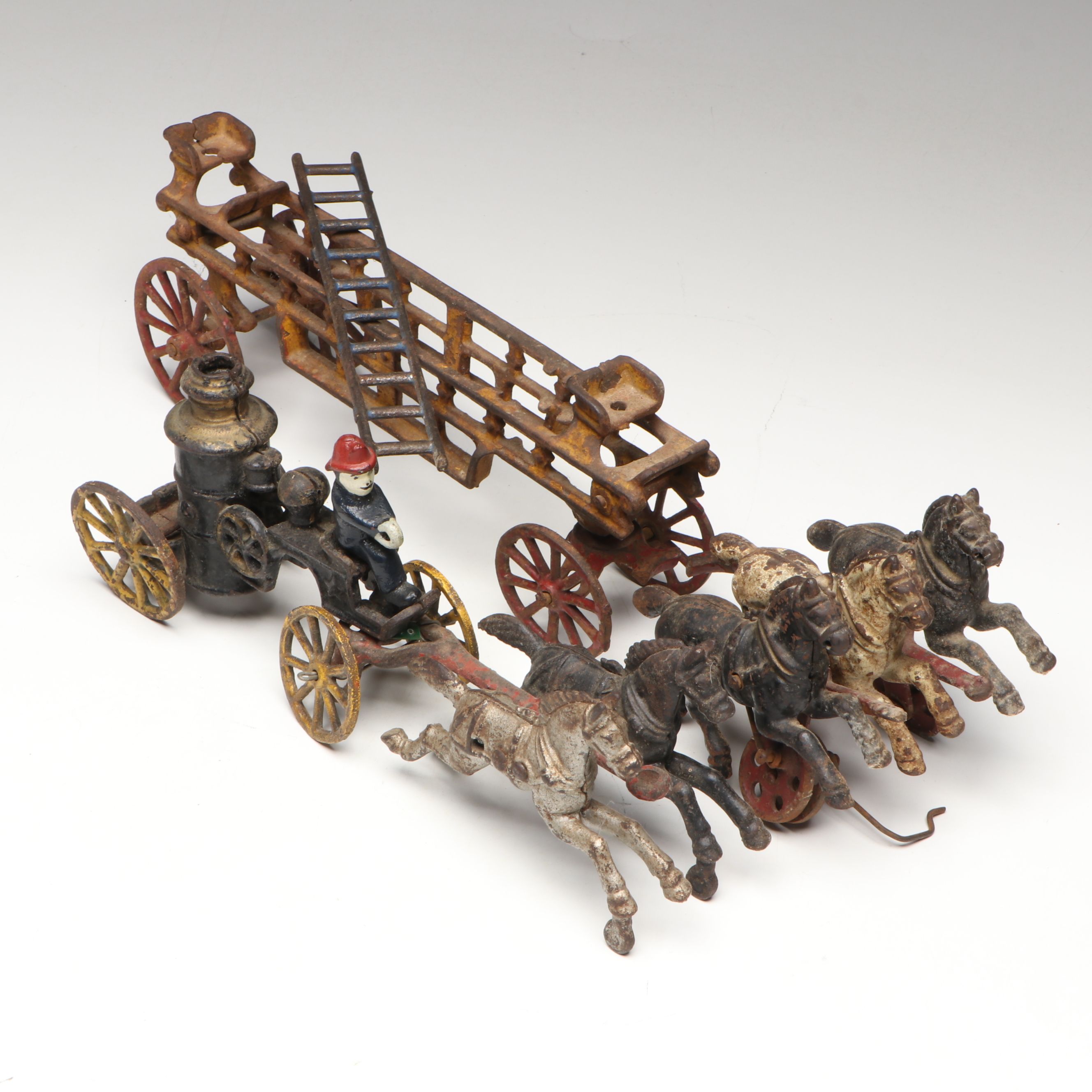 Hubley Cast Iron Horse-Drawn Fire Ladder and Water Wagon Toys