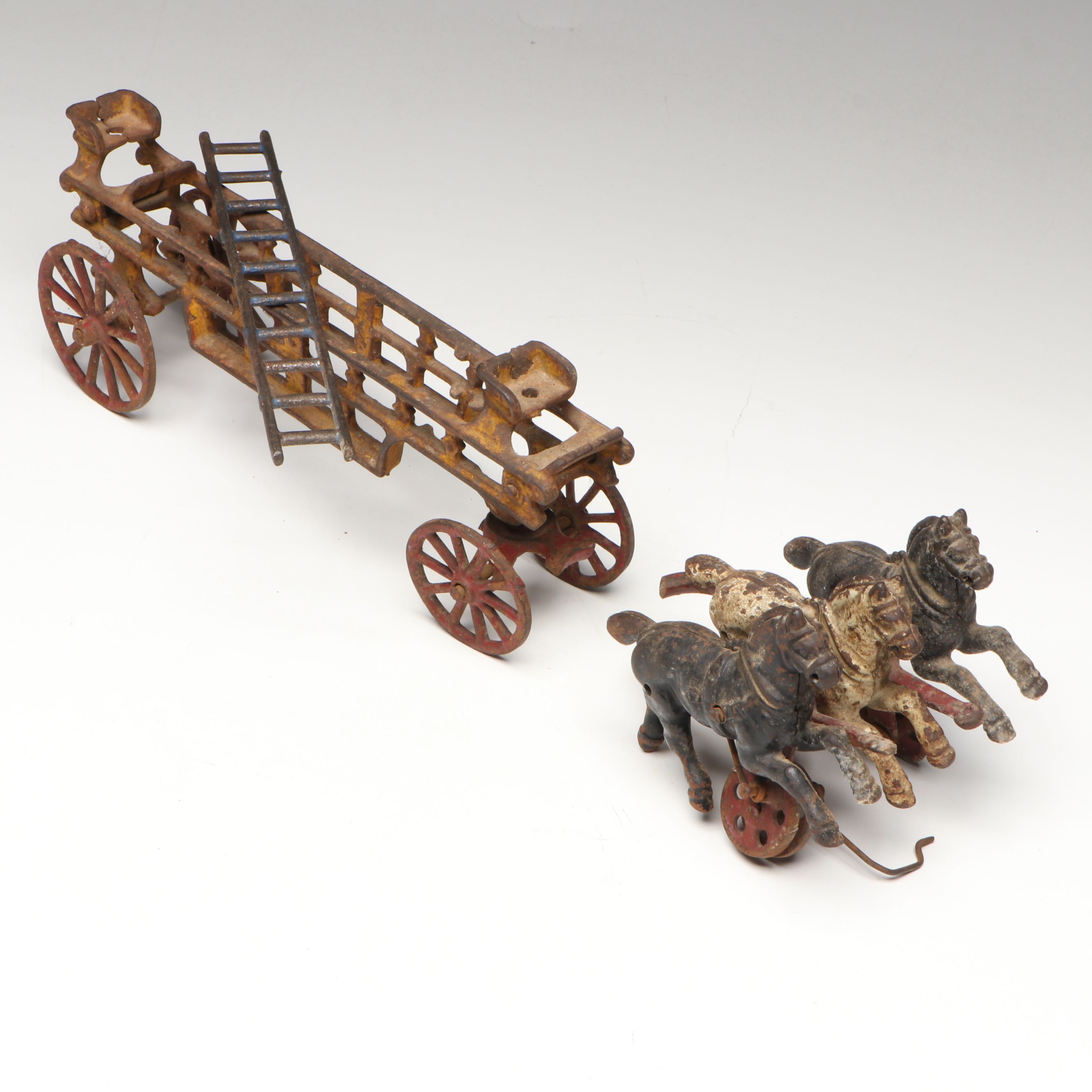 Hubley Cast Iron Horse-Drawn Fire Ladder and Water Wagon Toys