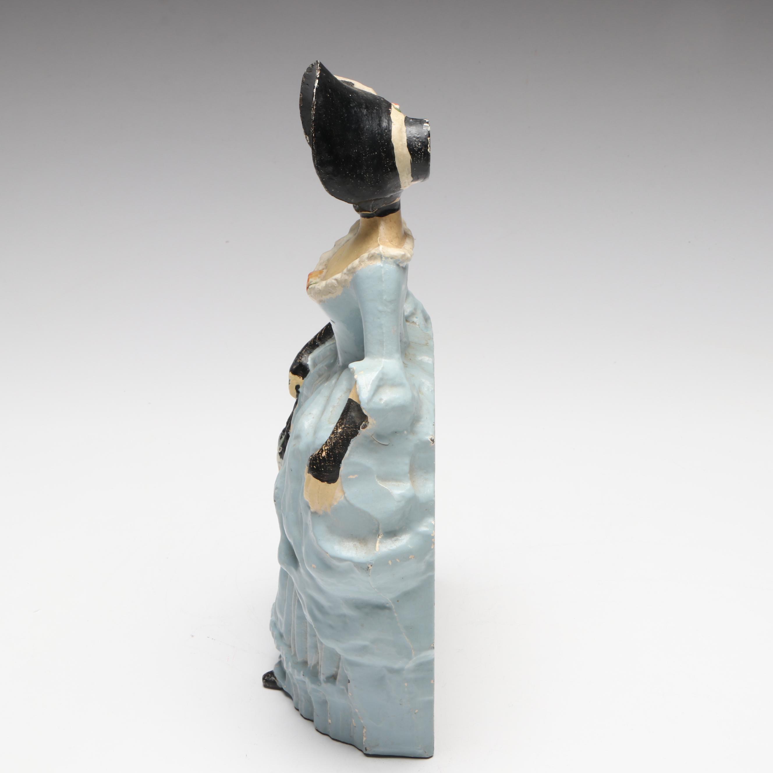LVL Colonial Woman Cold-Painted Cast Iron Doorstop, c. 1920