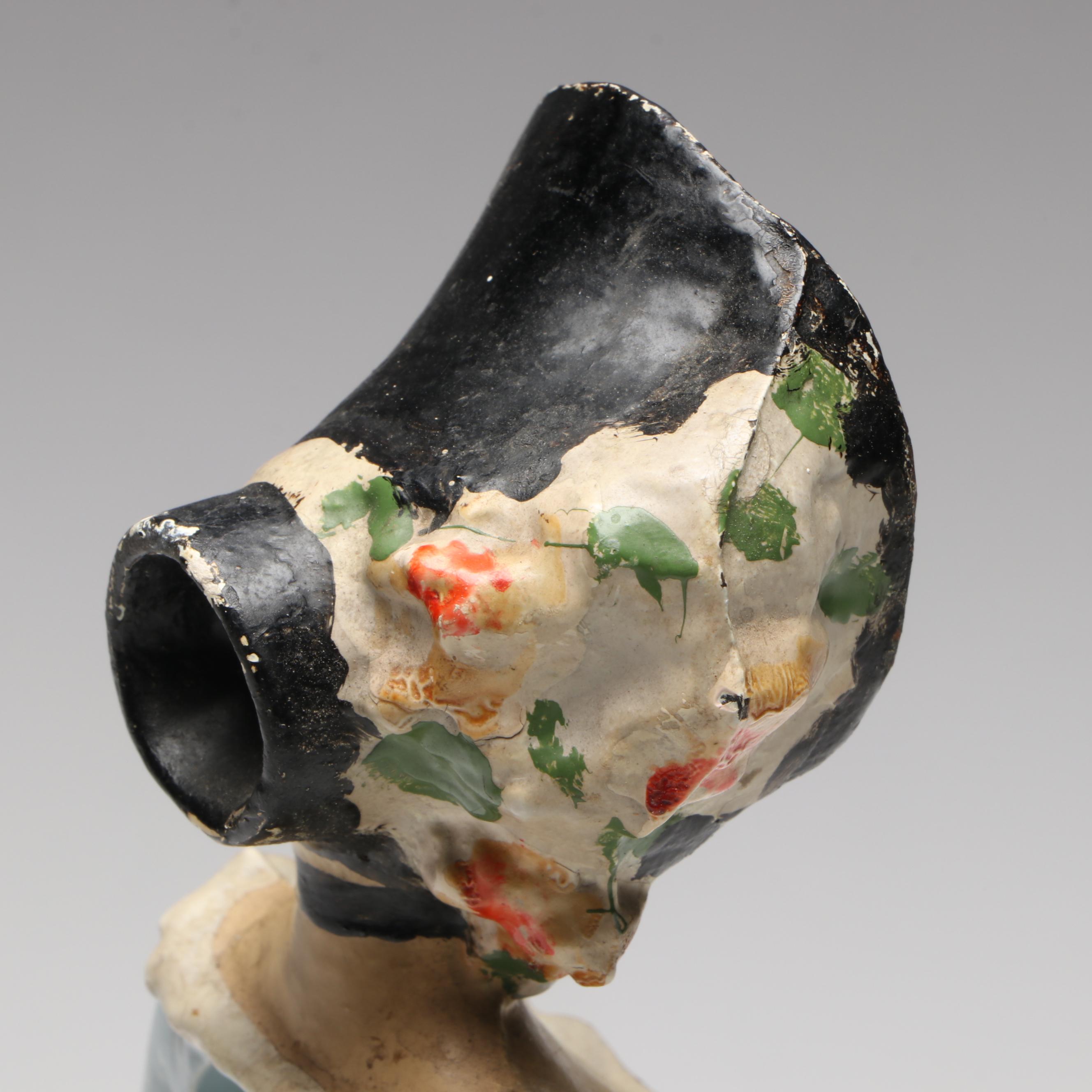 LVL Colonial Woman Cold-Painted Cast Iron Doorstop, c. 1920