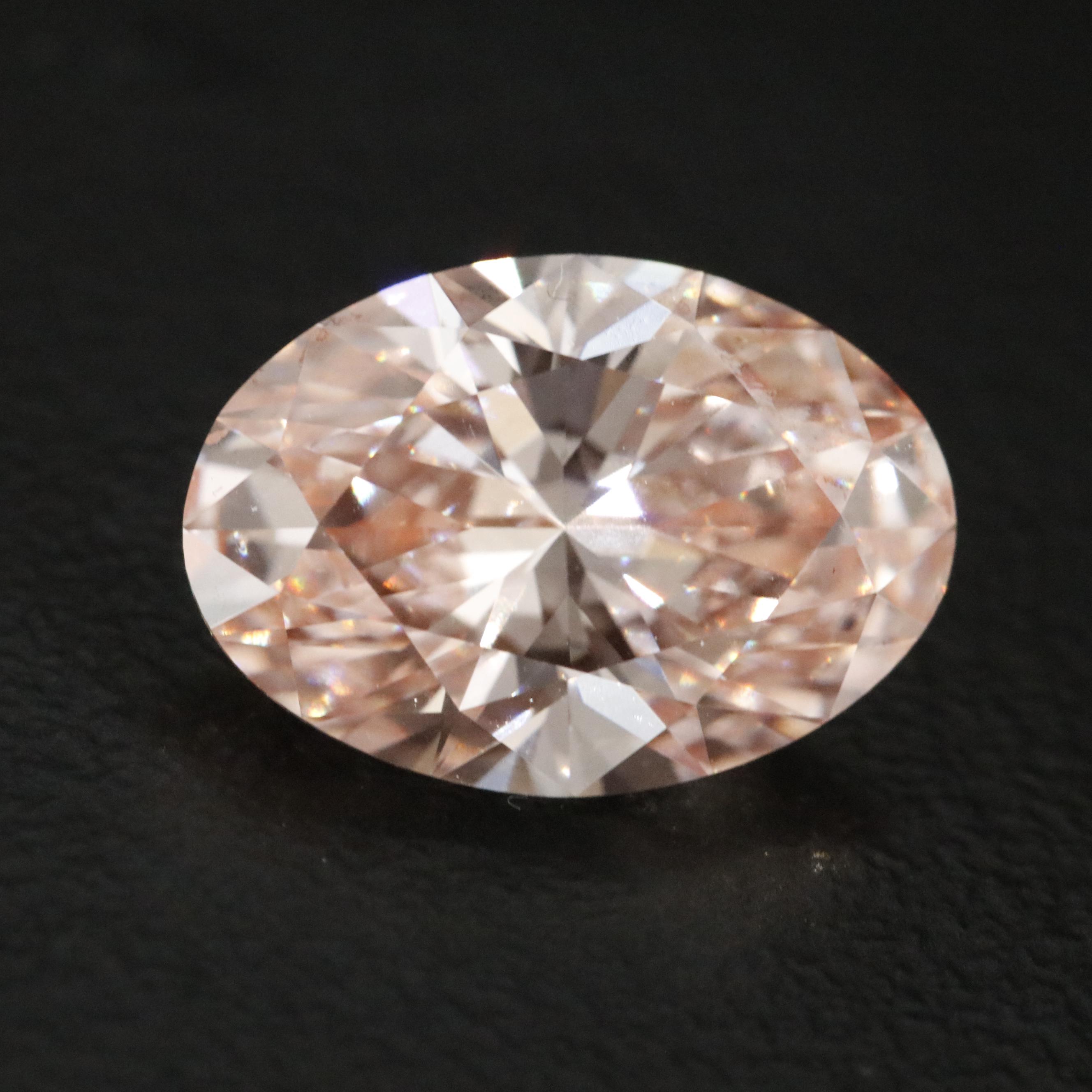 Loose 3.03 CT Fancy Vivid Pink Lab Grown Diamond with IGI Report