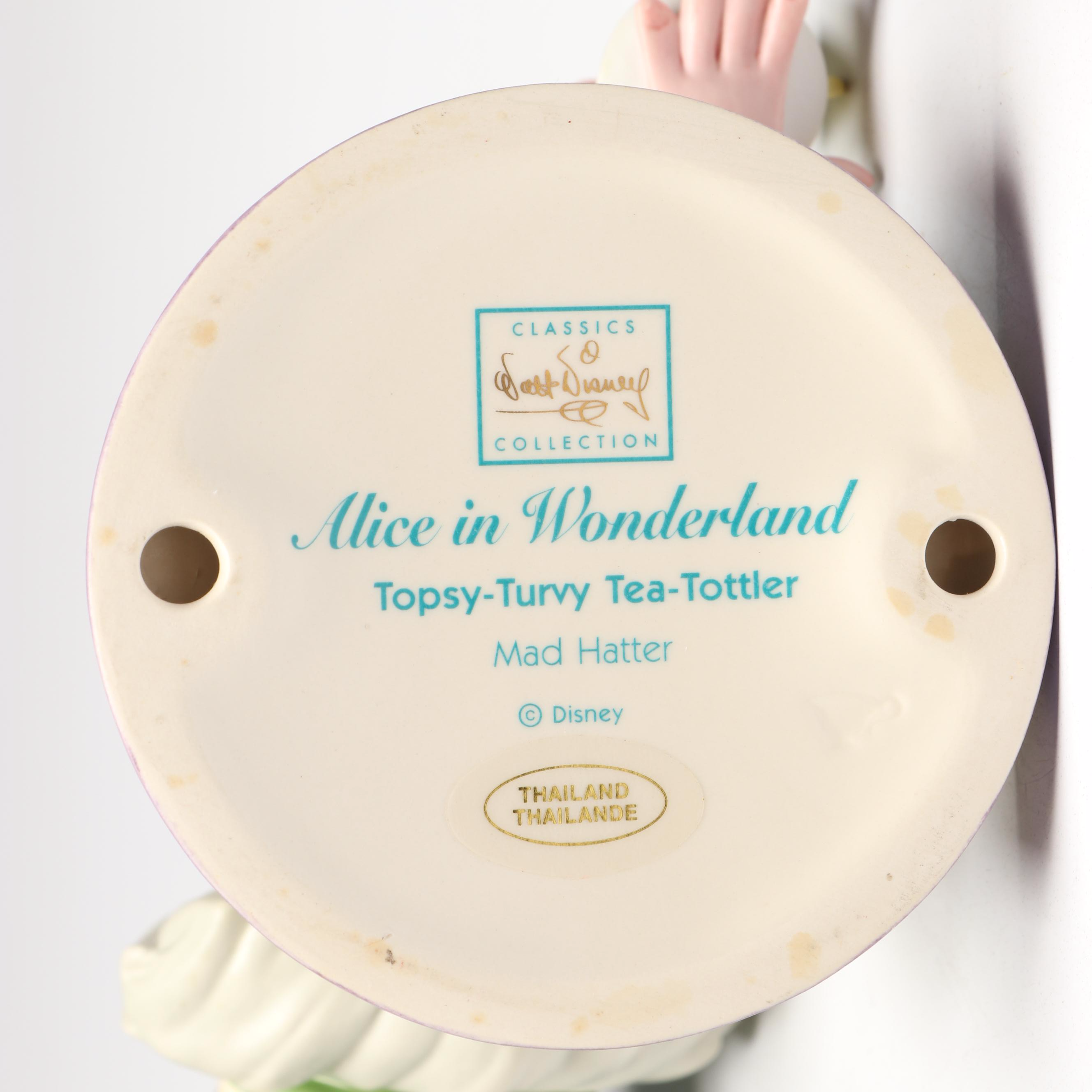 Disney"Topsy-Turvy Tea-Tottler" and "A Mad Whirl" Porcelain Figures, 2000s