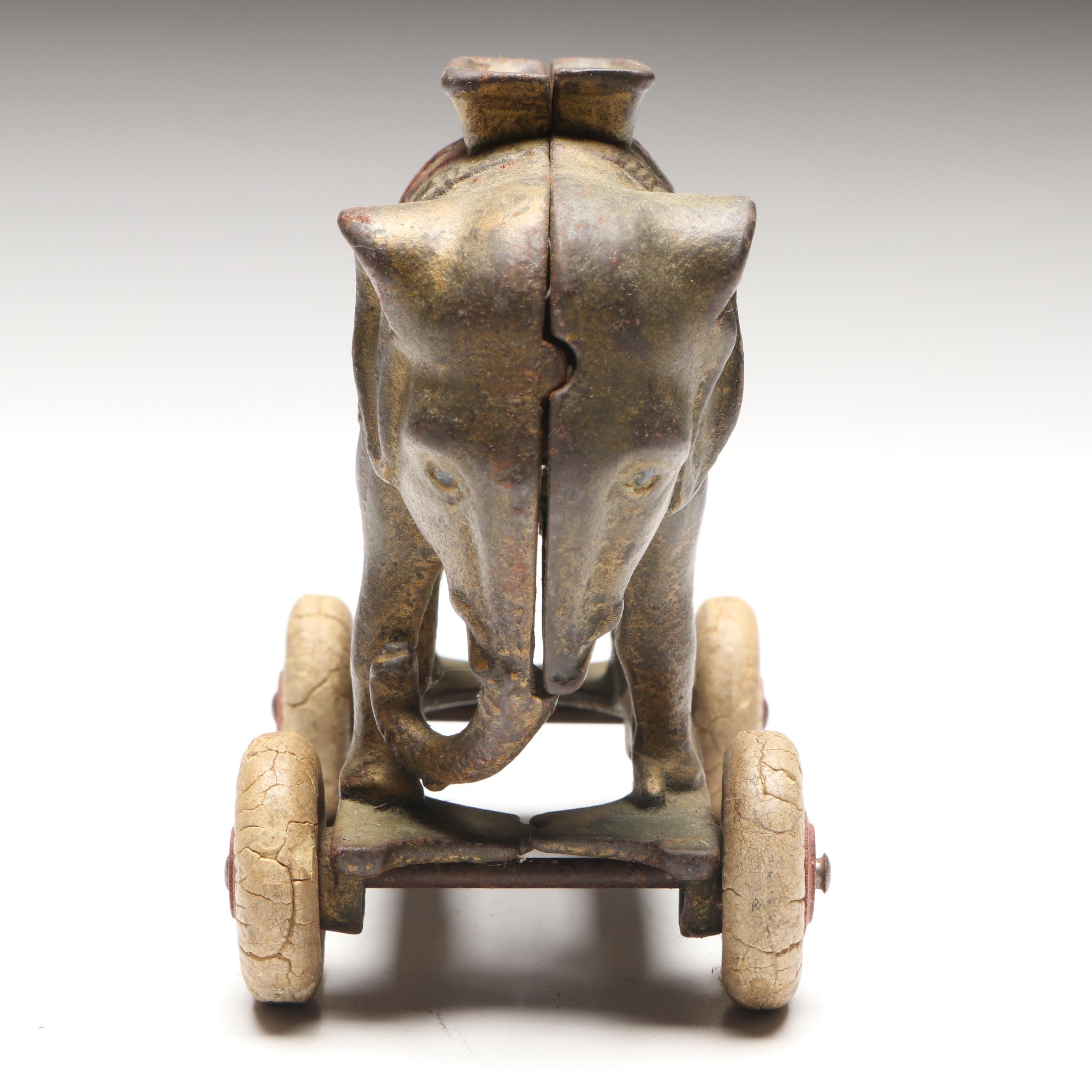 A. C. Williams Cast Iron Elephant Coin Bank on Wheels