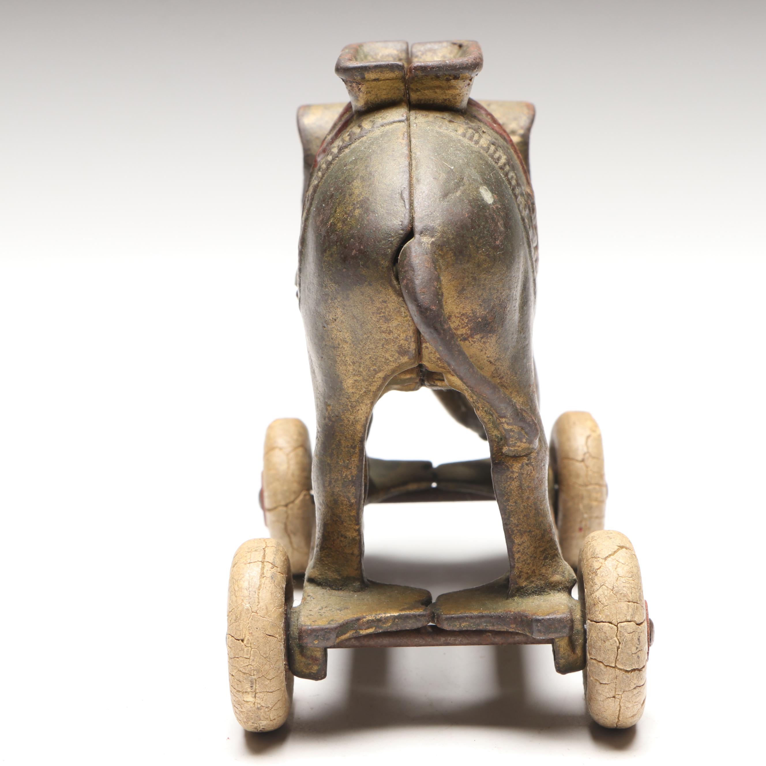 A. C. Williams Cast Iron Elephant Coin Bank on Wheels
