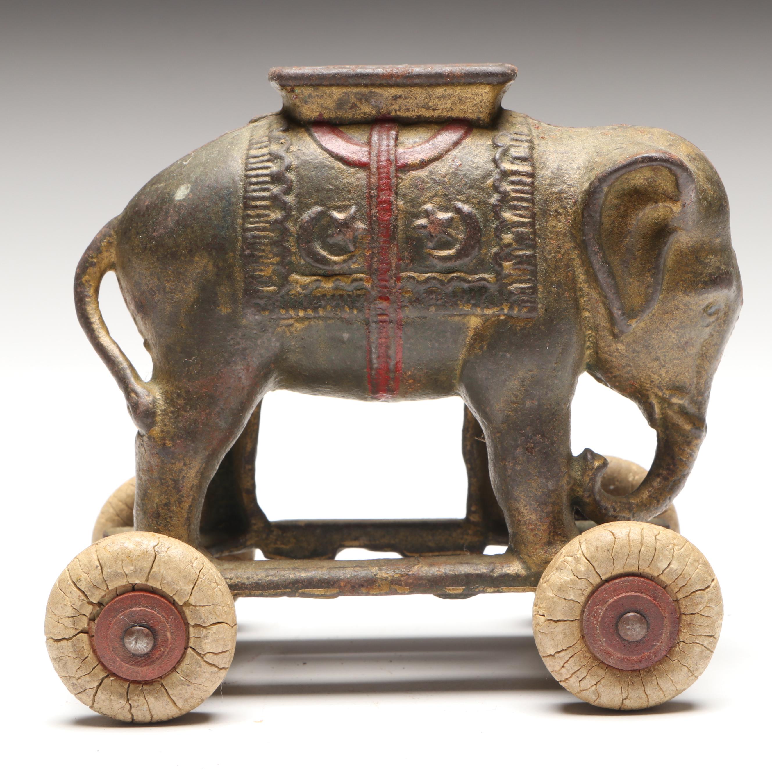 A. C. Williams Cast Iron Elephant Coin Bank on Wheels