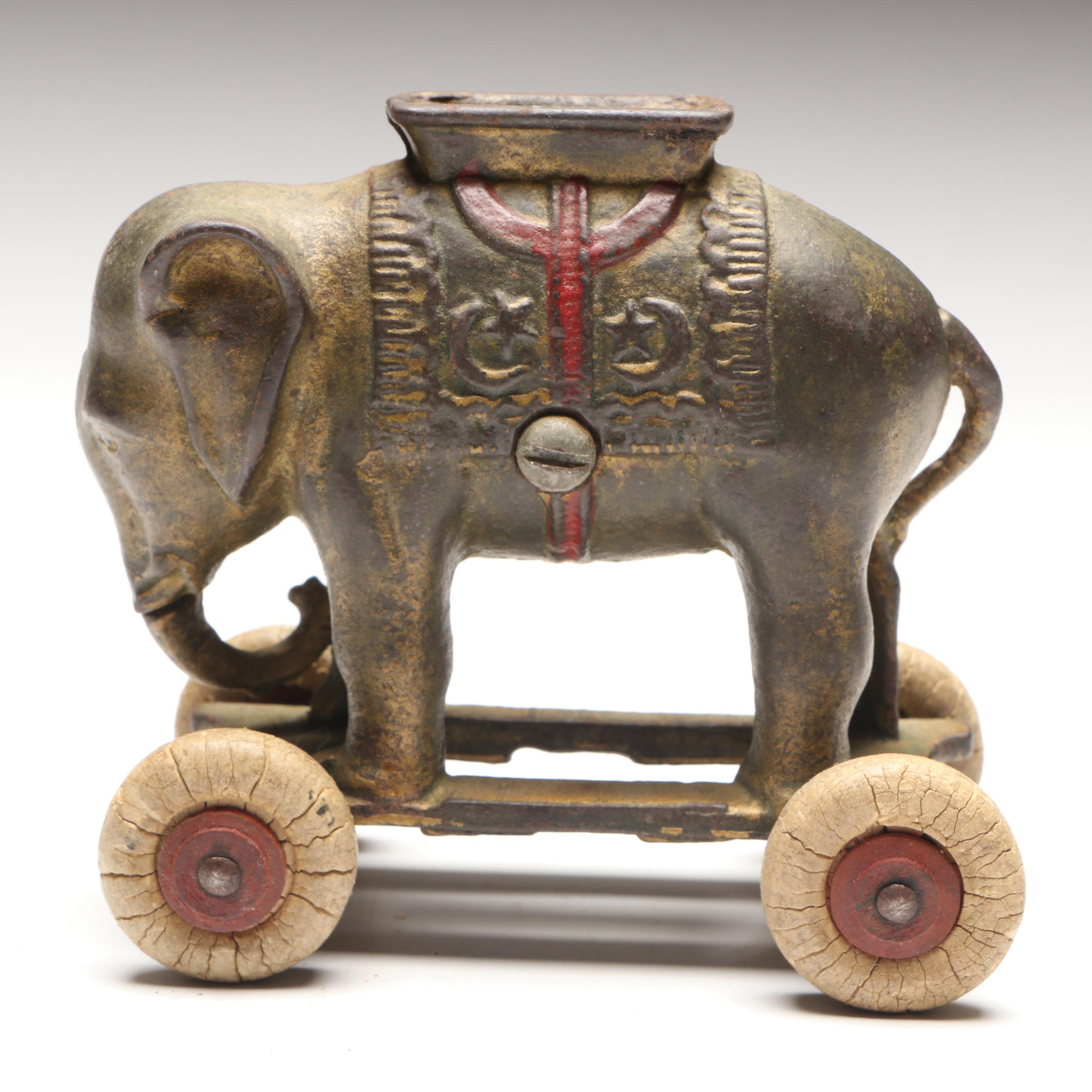 A. C. Williams Cast Iron Elephant Coin Bank on Wheels
