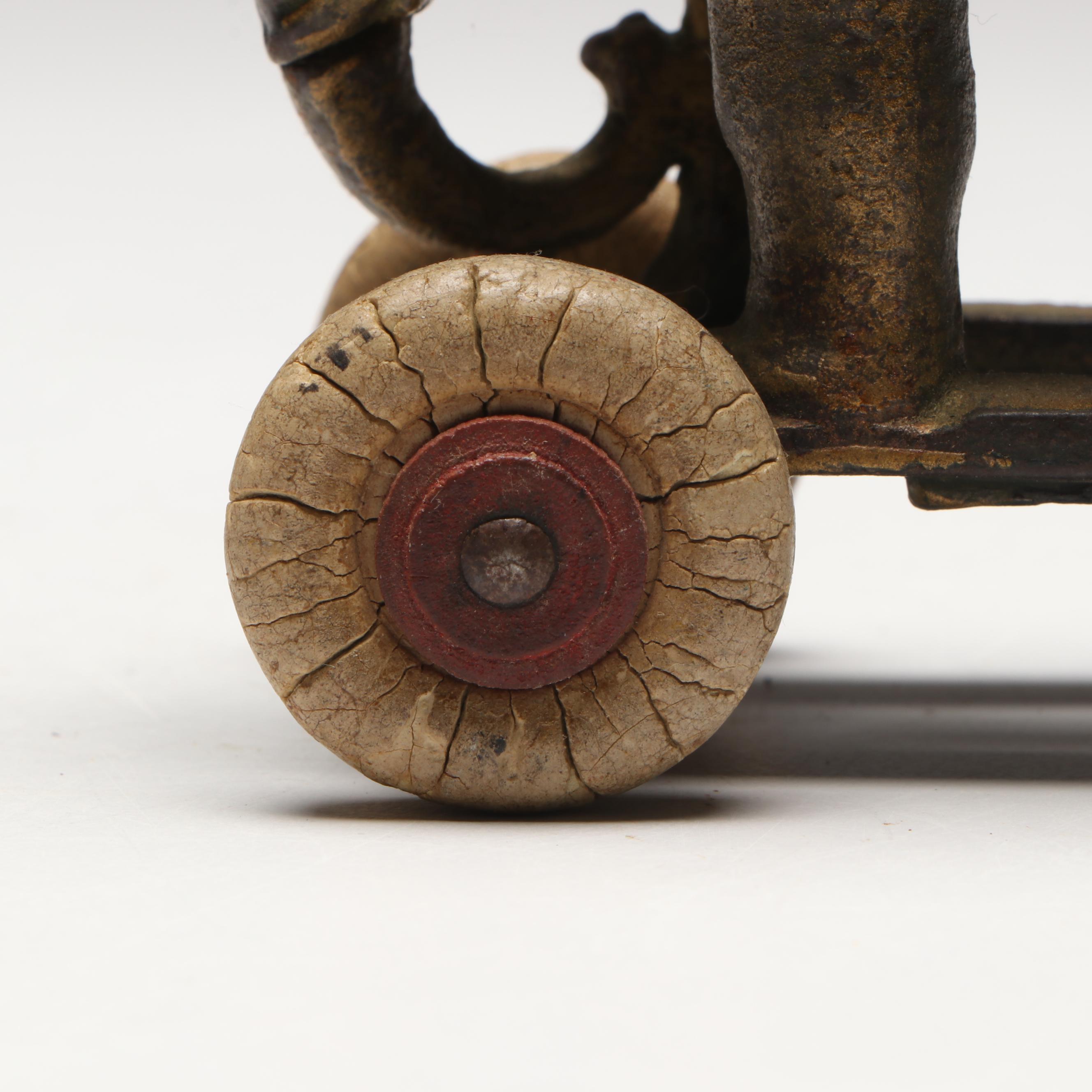 A. C. Williams Cast Iron Elephant Coin Bank on Wheels