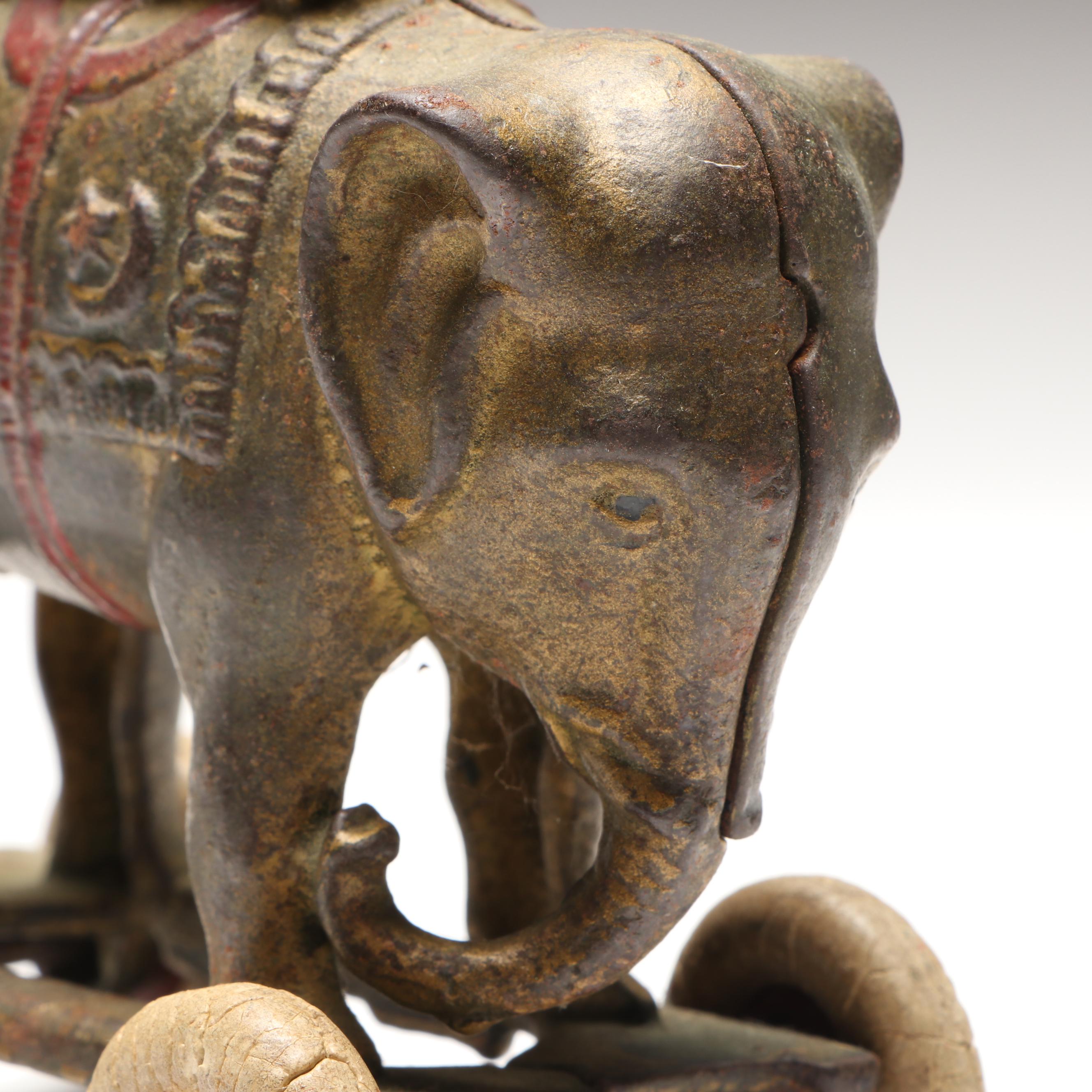 A. C. Williams Cast Iron Elephant Coin Bank on Wheels